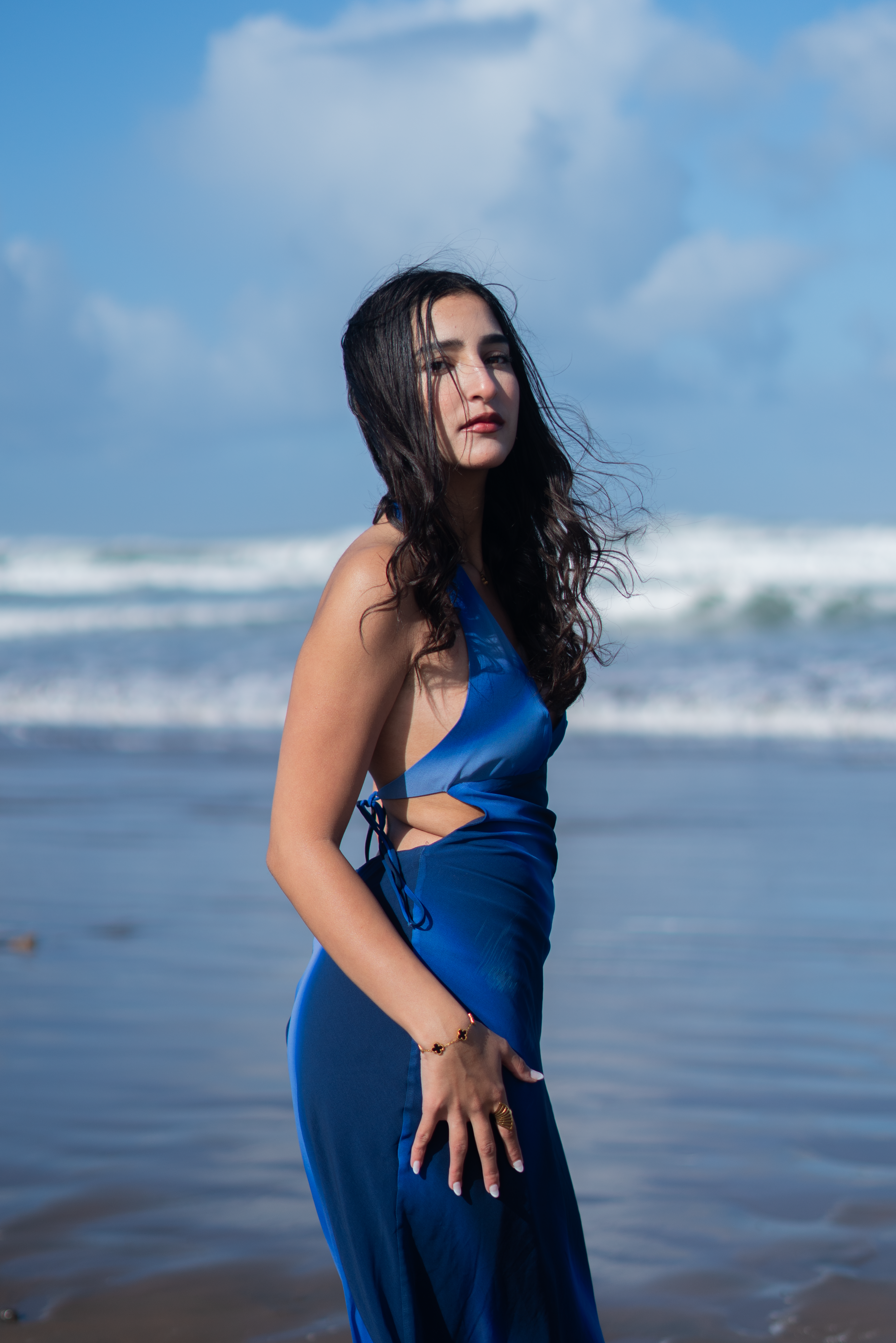 Elegant Woman in Blue Dress on Moroccan Beach · Free Stock Photo