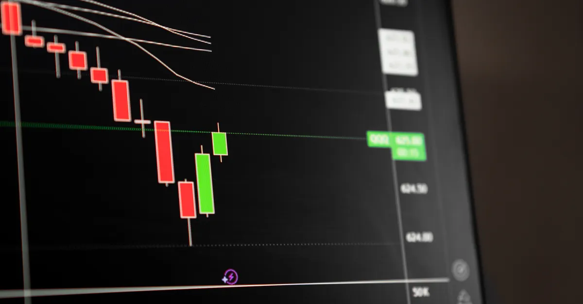A candlestick stock-market chart on a screen, representing securities-market regulation