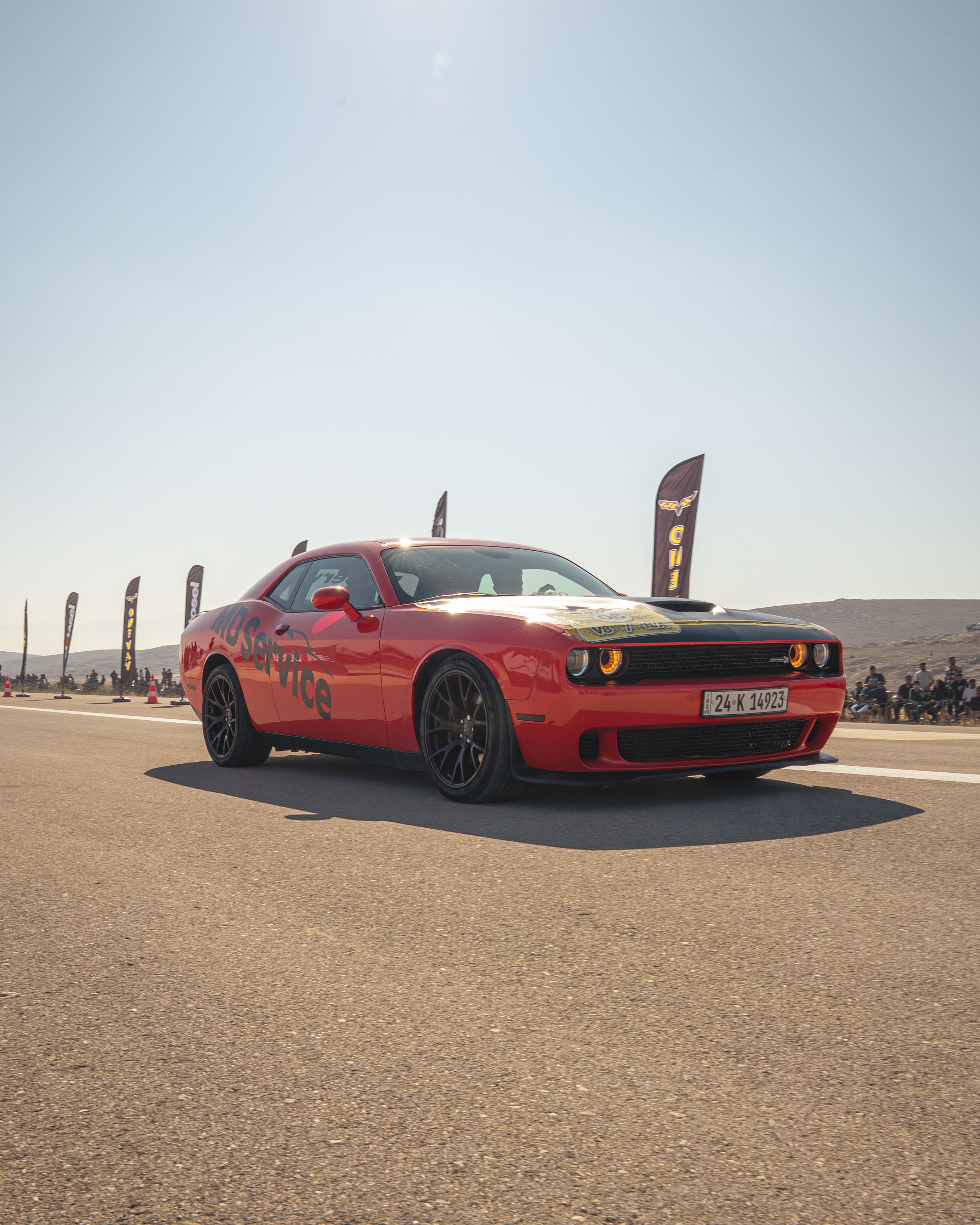 Red Sports Car Racing on Open Road · Free Stock Photo