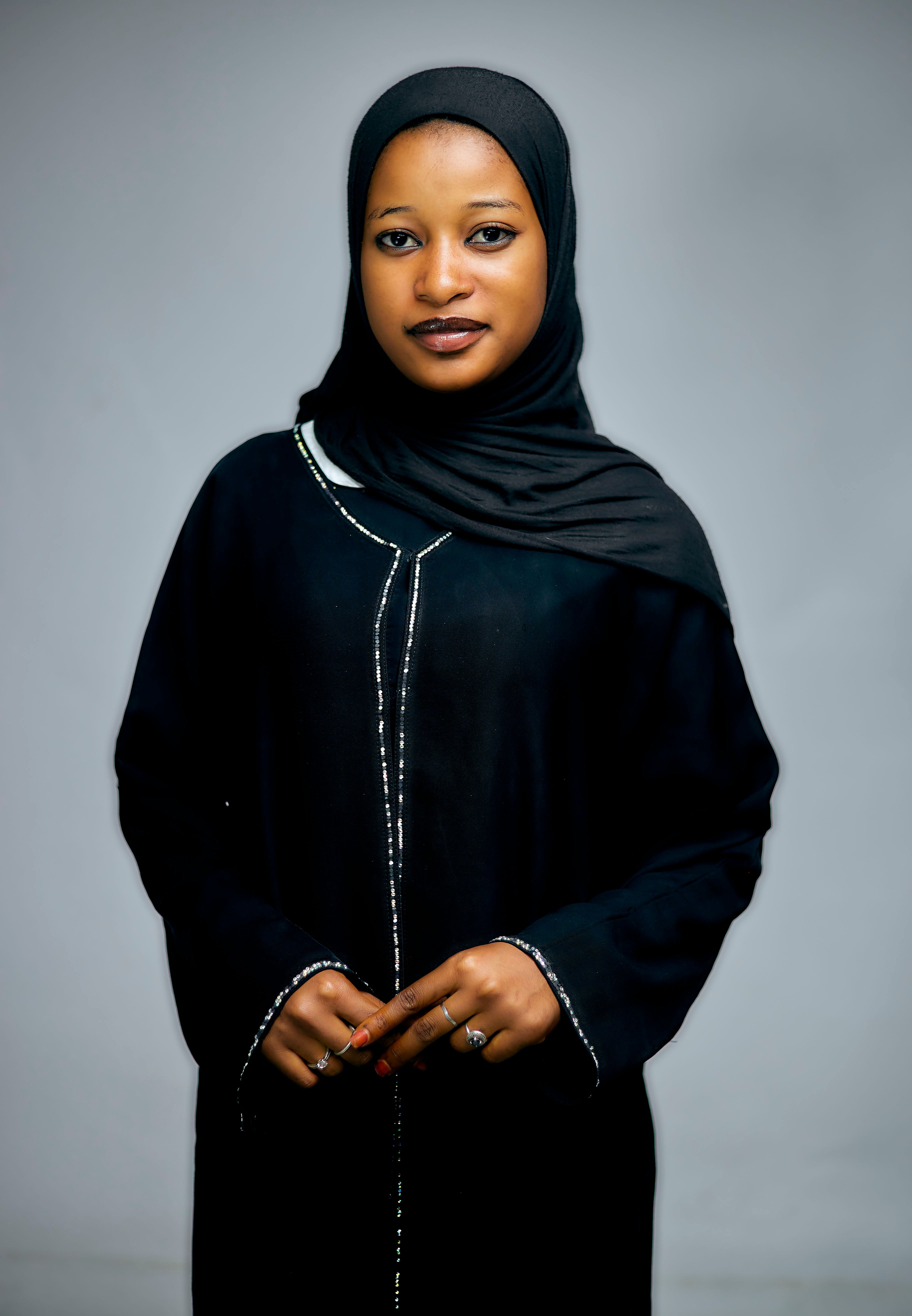 Woman wearing black hijab and abaya