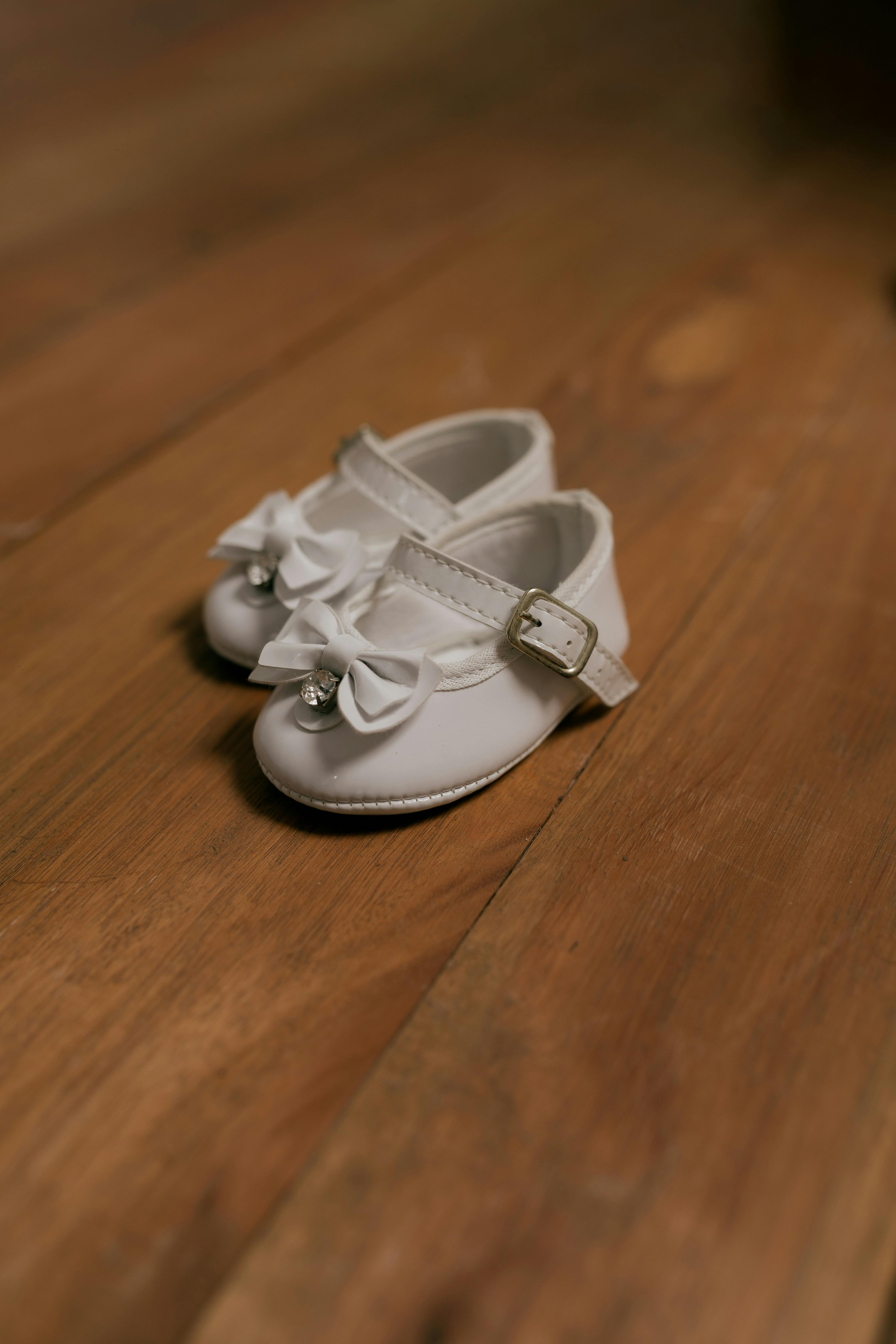 De franc Foto d'estoc gratuïta de accessoris infantils, accessoris per a nadons, adorables sabates de nadó Foto d'estoc