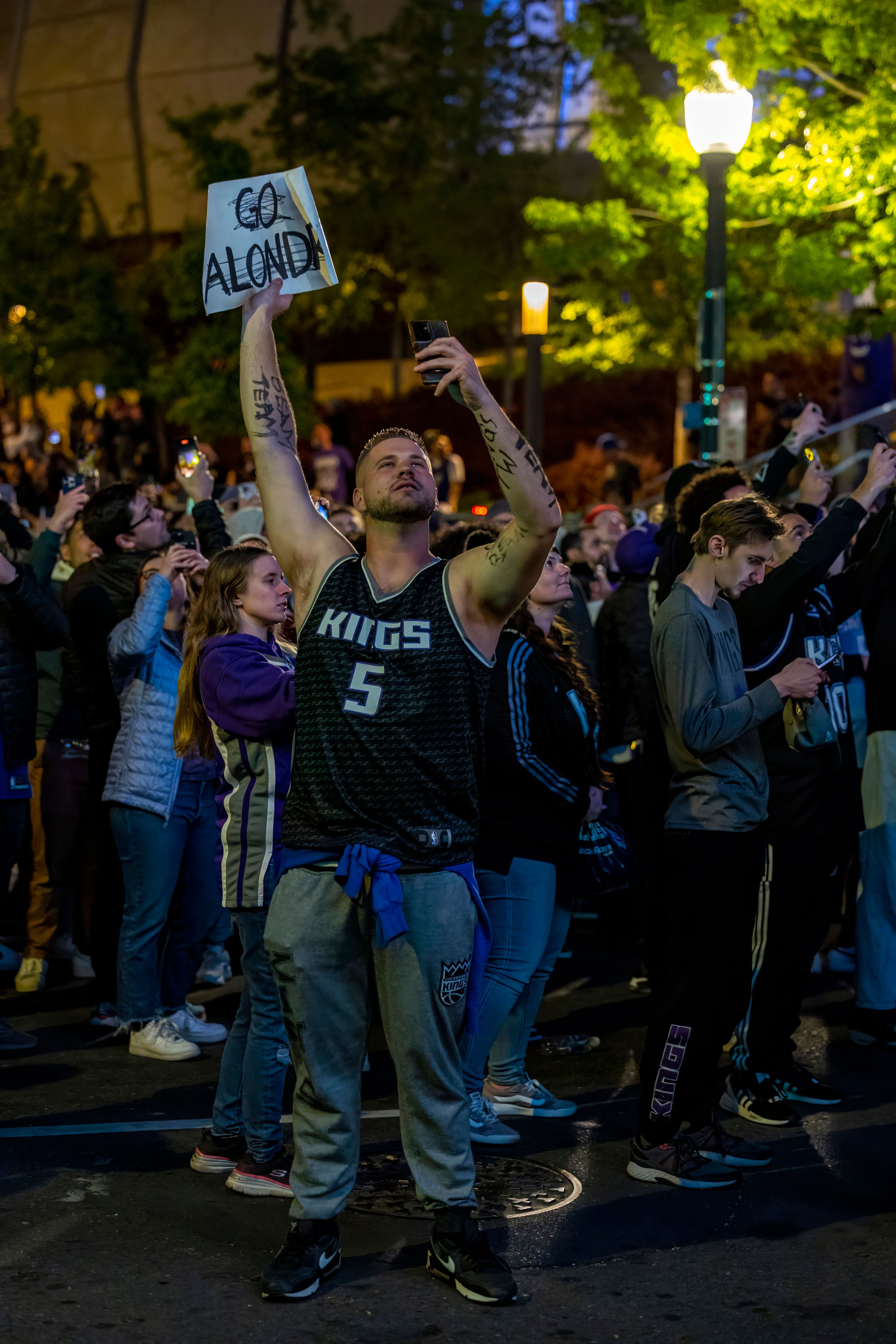 Basketball Fans Celebrating at Night Event · Free Stock Photo