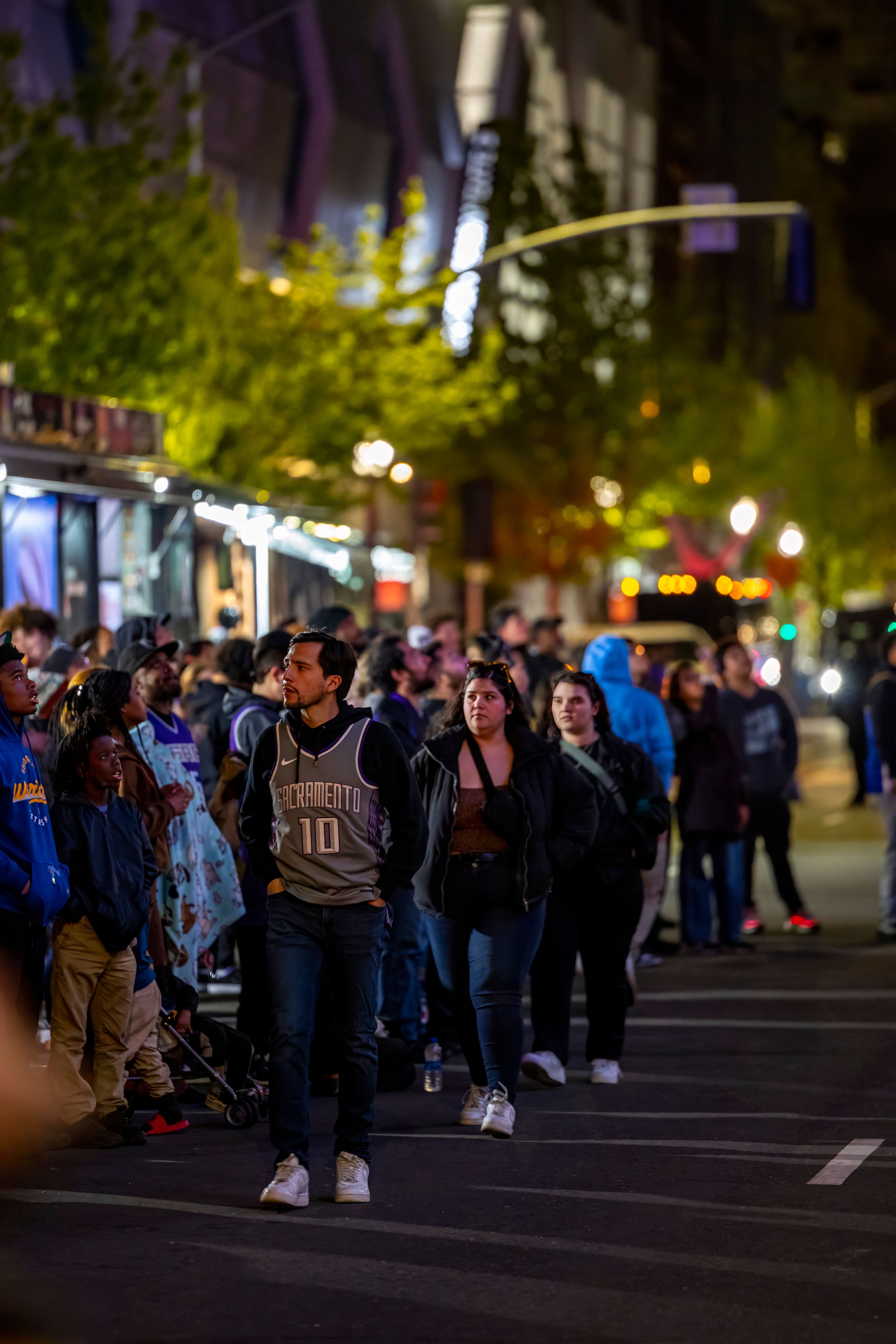 Vibrant City Nightlife Crowd on Urban Street · Free Stock Photo