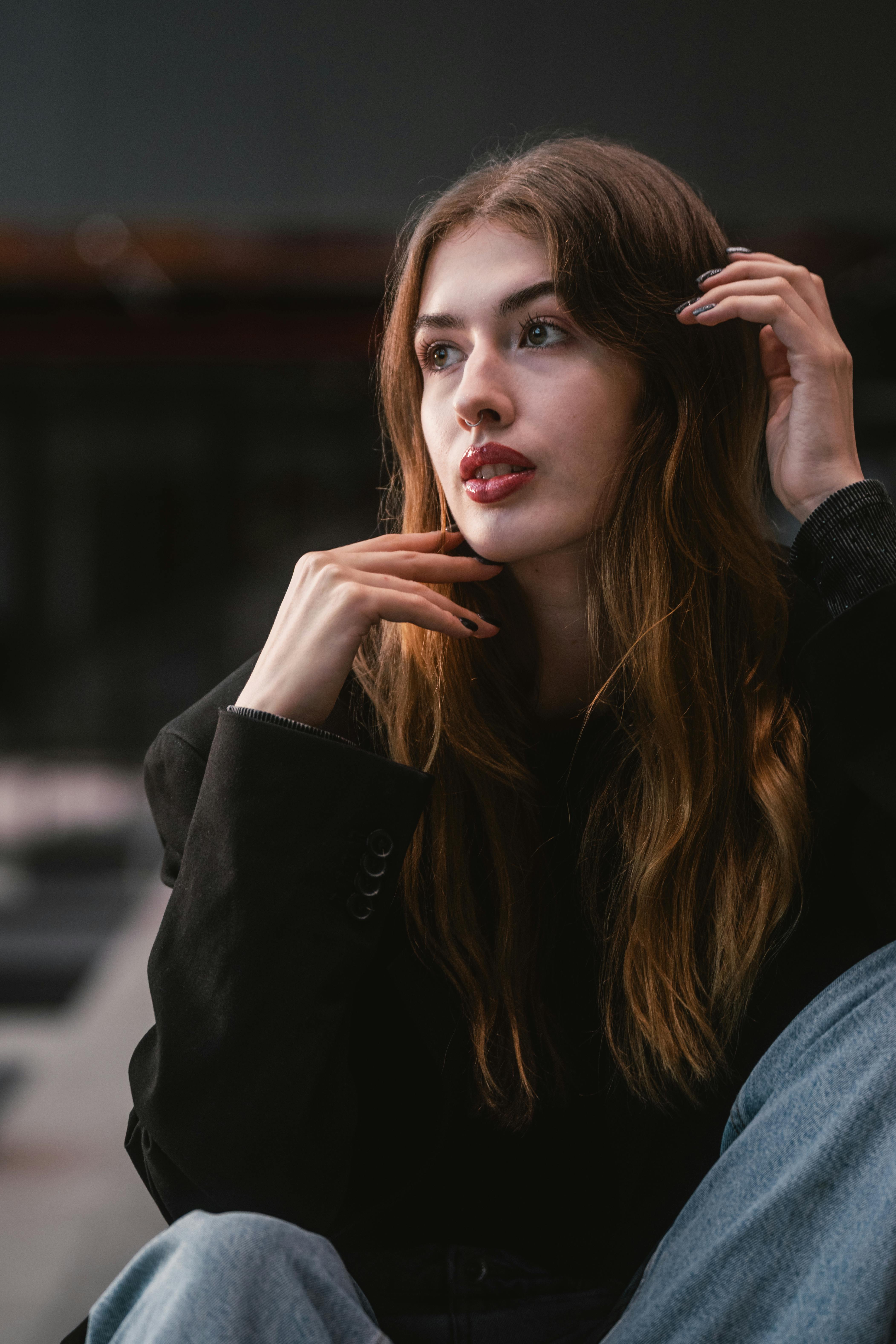 Stylish Woman Posing in Urban Setting · Free Stock Photo