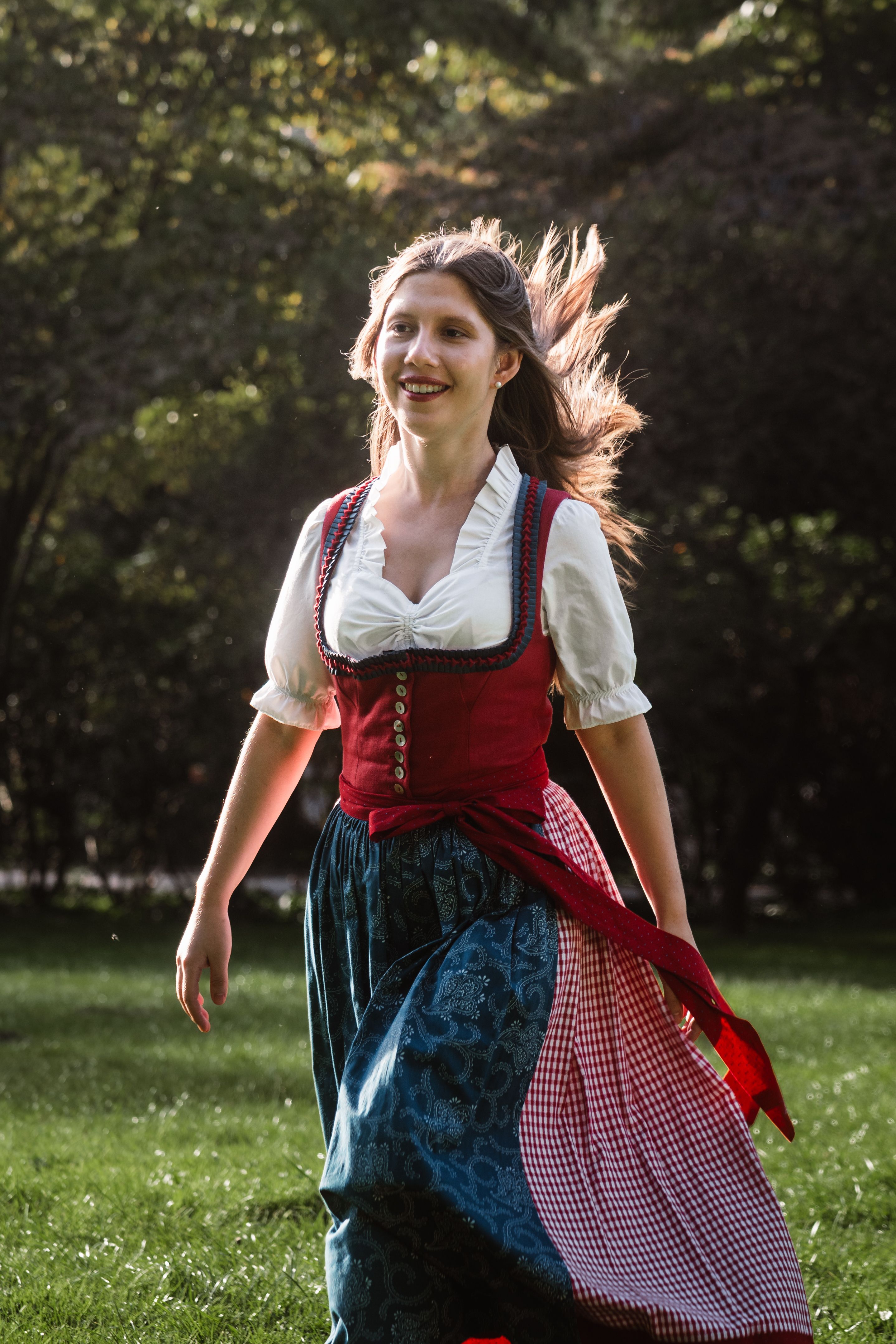 Young Woman in Traditional Austrian Dress Outdoors · Free Stock Photo