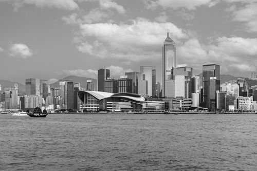 Free Black and white view of Hong Kong skyline and harbor, featuring iconic skyscrapers. Stock Photo