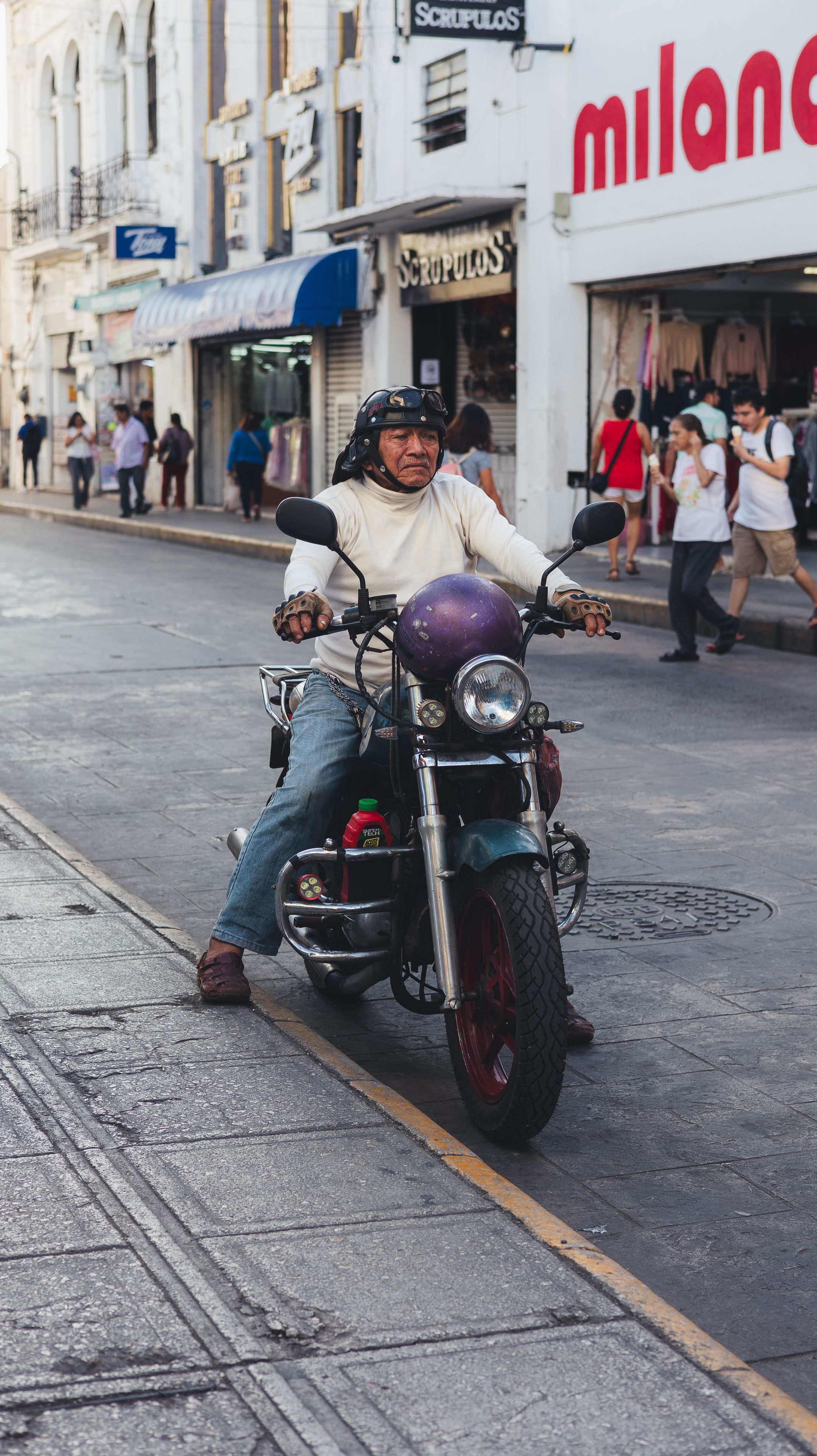 Urban Motorcyclist on Busy City Street · Free Stock Photo