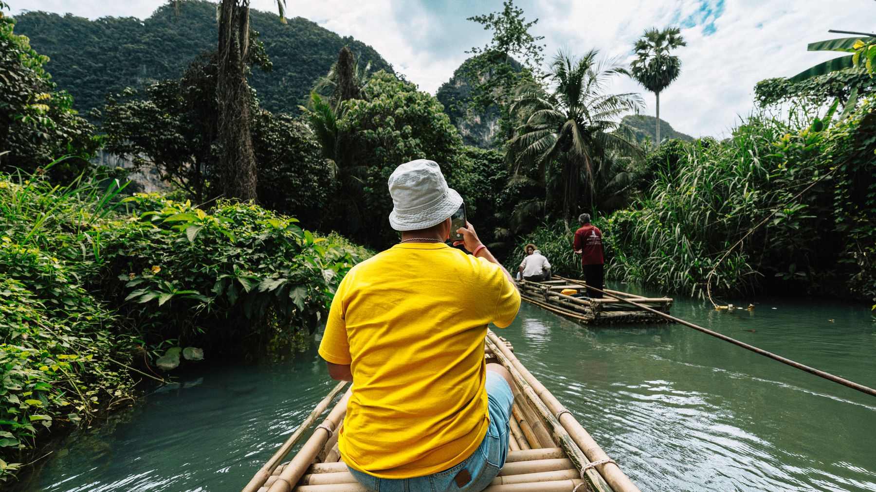 Experience the lush jungle of Krabi with a tranquil bamboo rafting adventure.