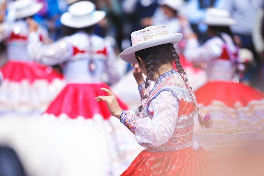 Vibrant traditional costume dance during a festive parade in Arequipa, Peru.