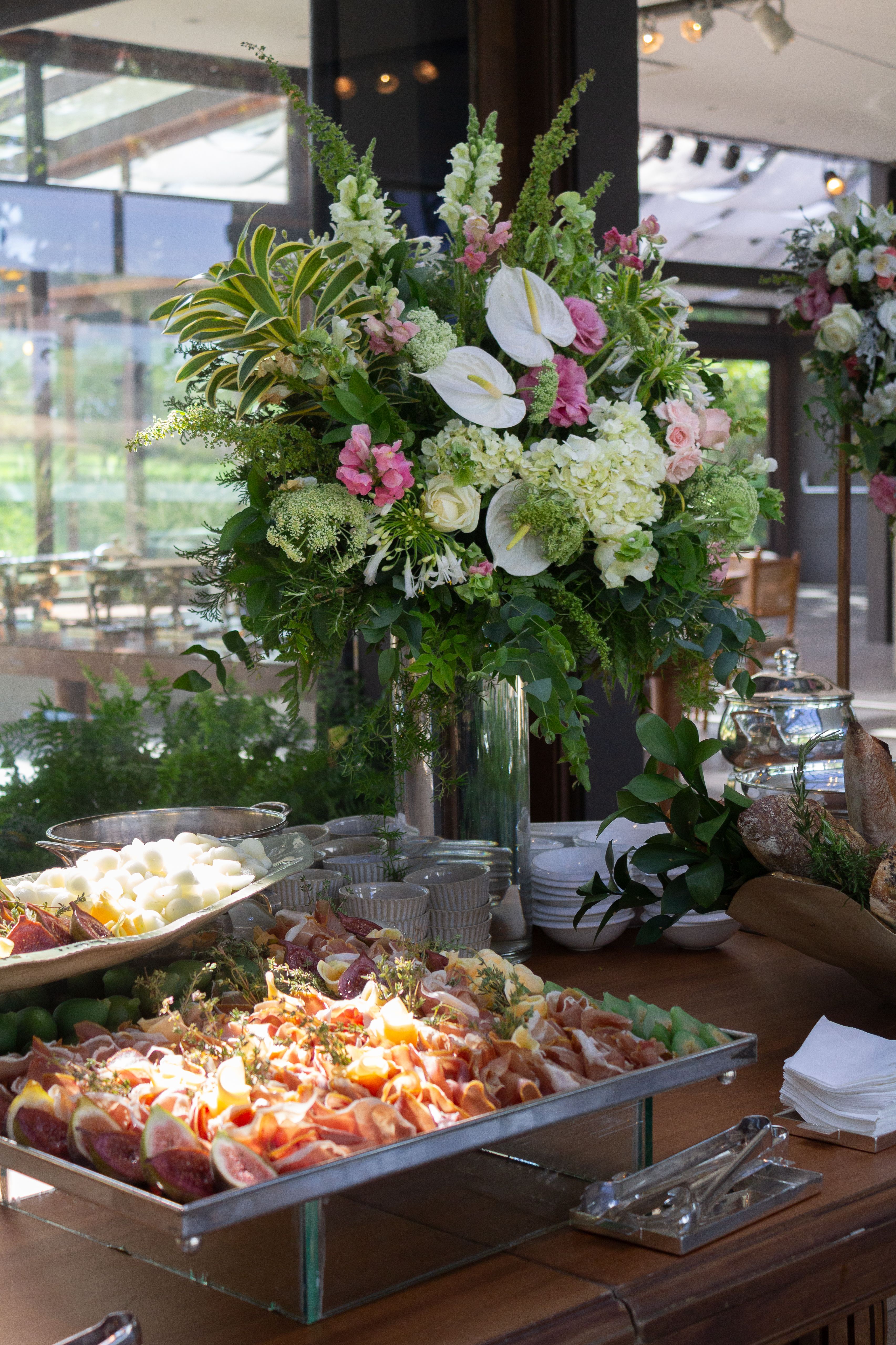 Elegant Buffet with Floral Arrangements in São Paulo · Free Stock Photo