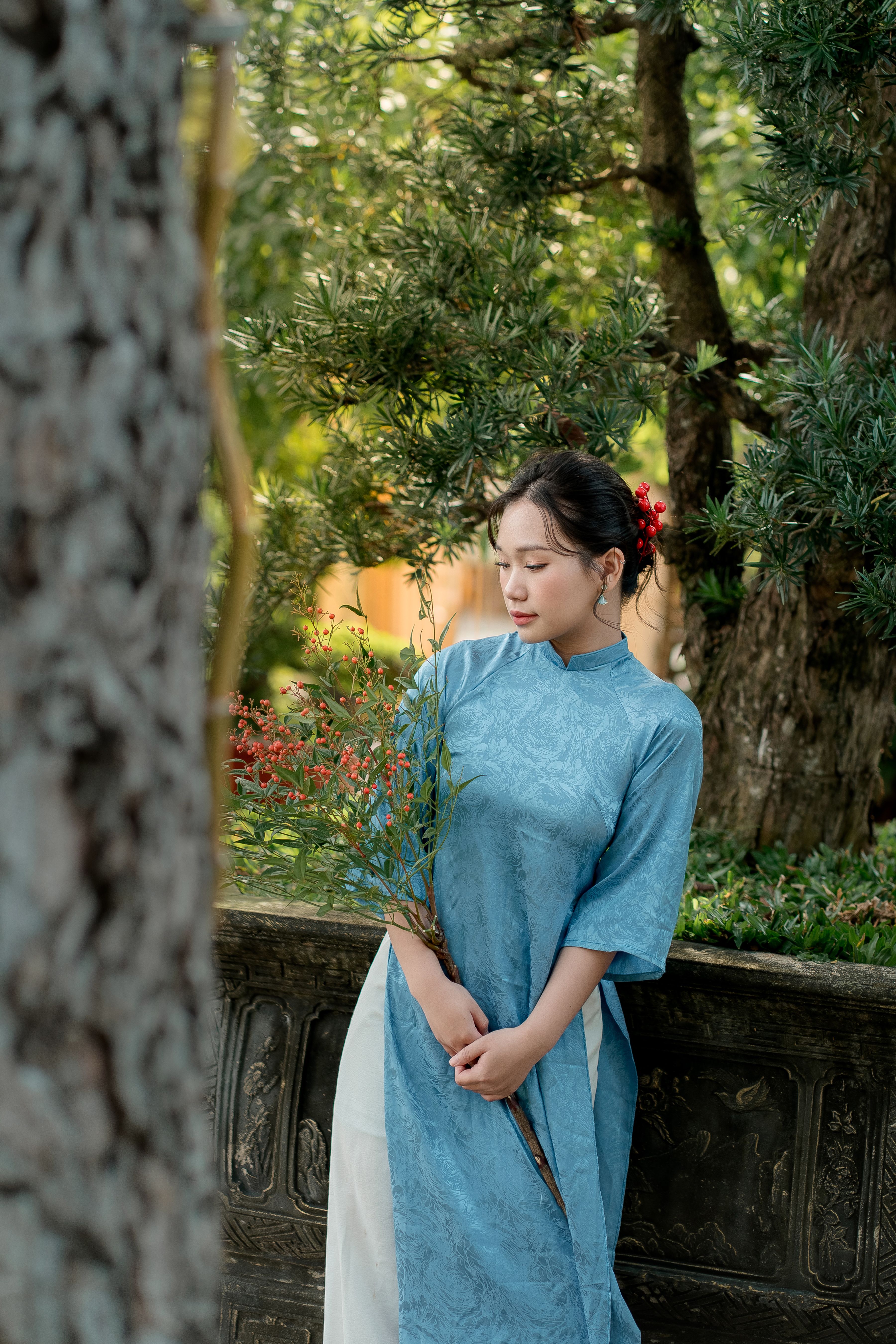 Young Woman in Traditional Blue Dress Outdoors · Free Stock Photo