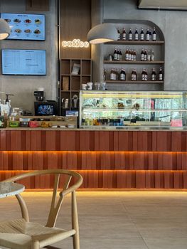 Modern coffee shop interior featuring sleek design elements and a warm ambiance.