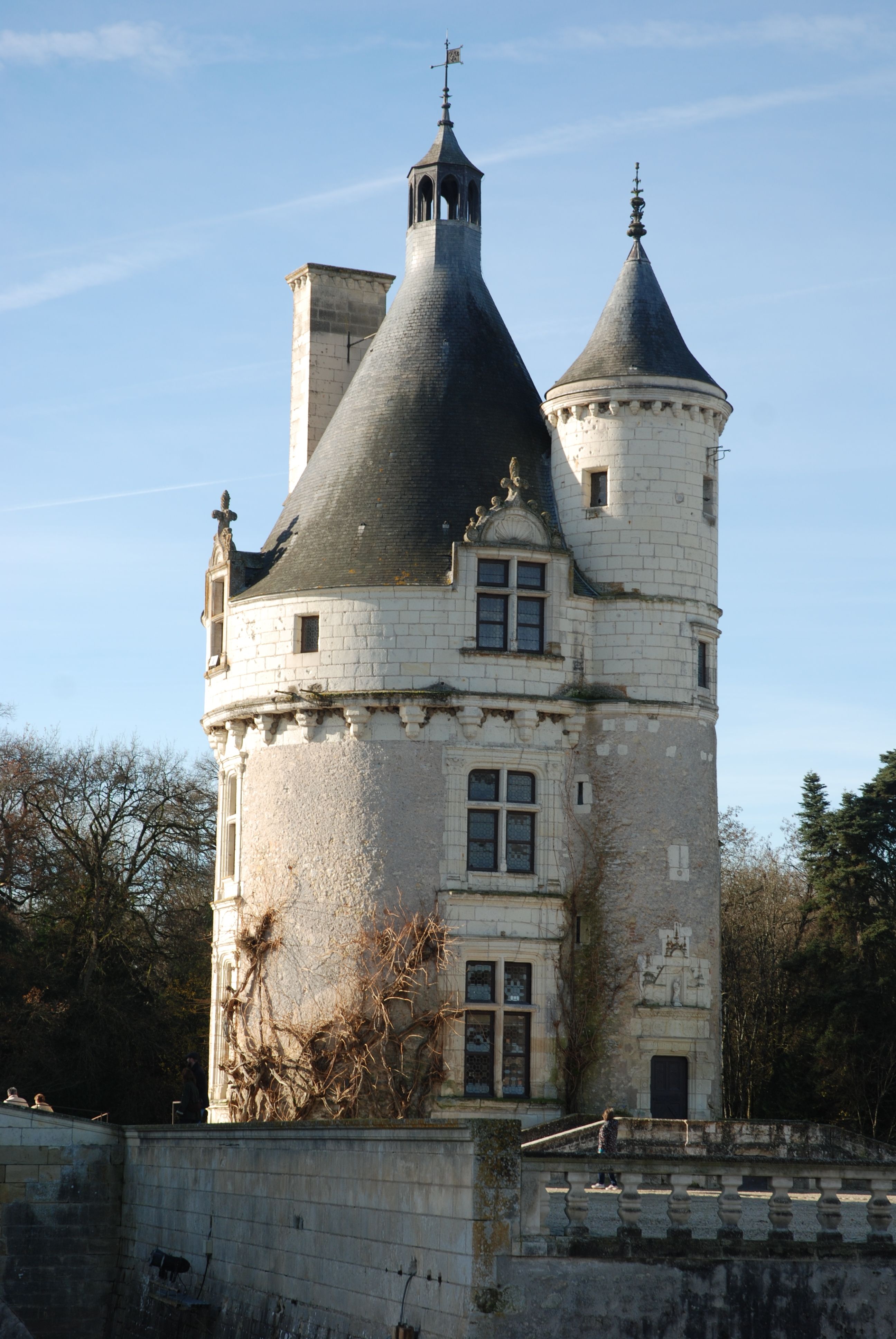 Elegant tower of Château de Chenonceau under clear sky in France, showcasing architectural beauty.