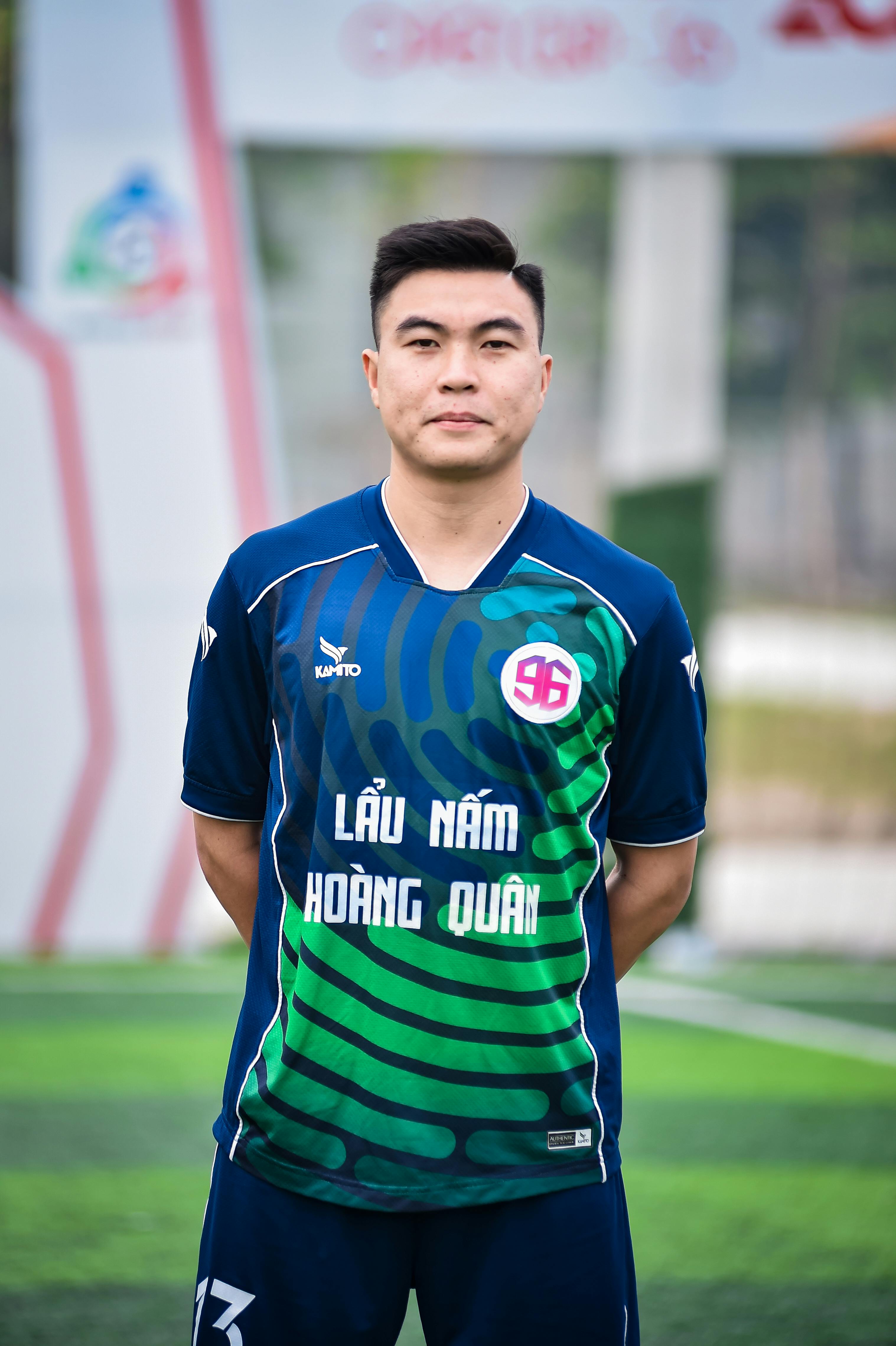 Portrait of a football player in Hanoi, Vietnam on a sports field.