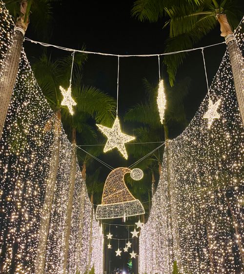 Free Bright Christmas lights and decorations shining in Kaohsiung City, Taiwan at night. Stock Photo