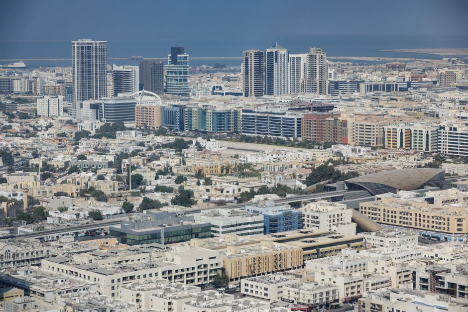 Unforgettable Dubai Helicopter Tour: Experience Dubai's Iconic Landmarks Review Review 2026 - Expansive aerial shot capturing Dubai's modern cityscape with diverse architecture and bustling urban life.