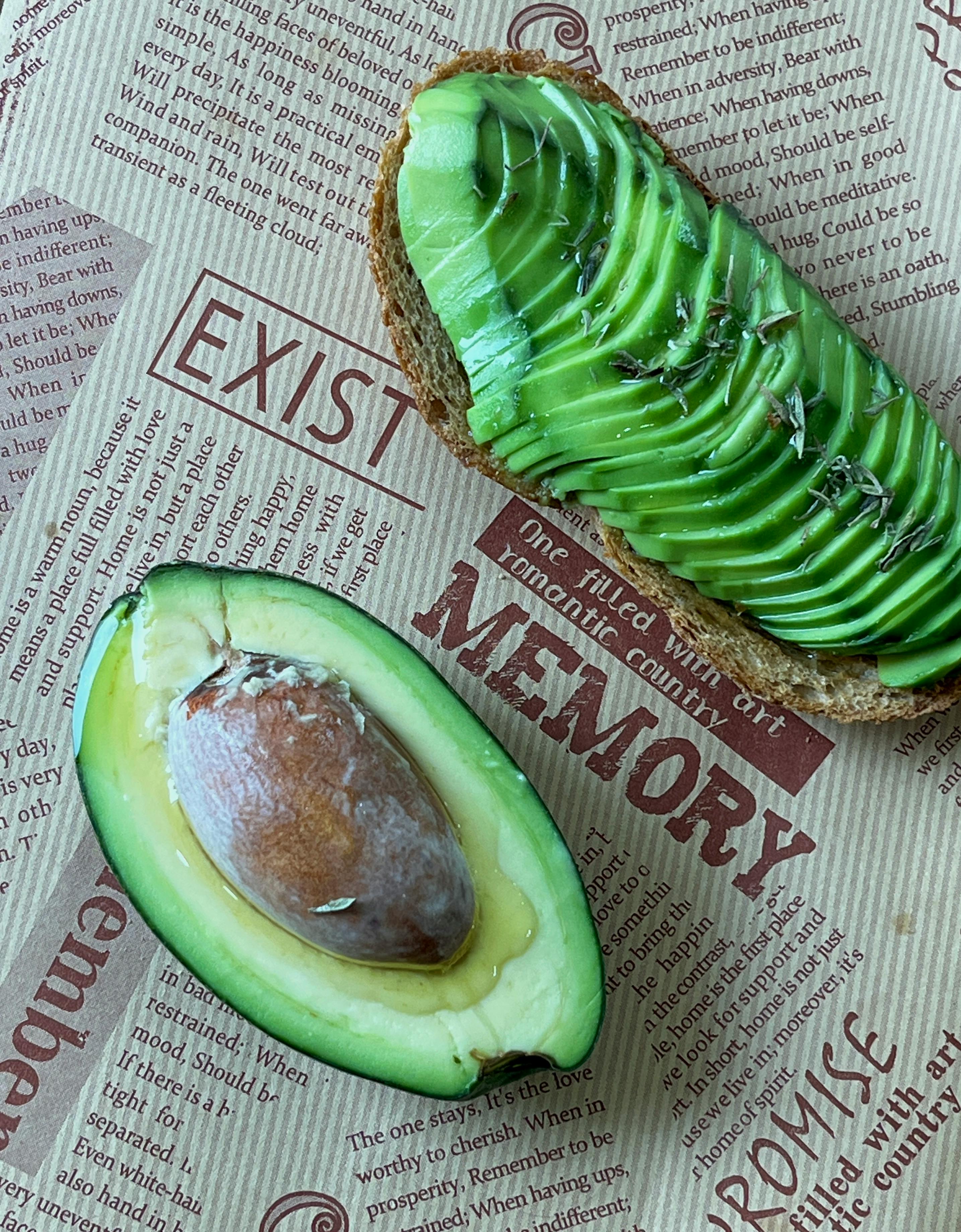Tasty avocado toast with freshly sliced avocado on rustic bread, perfect for a healthy snack.
