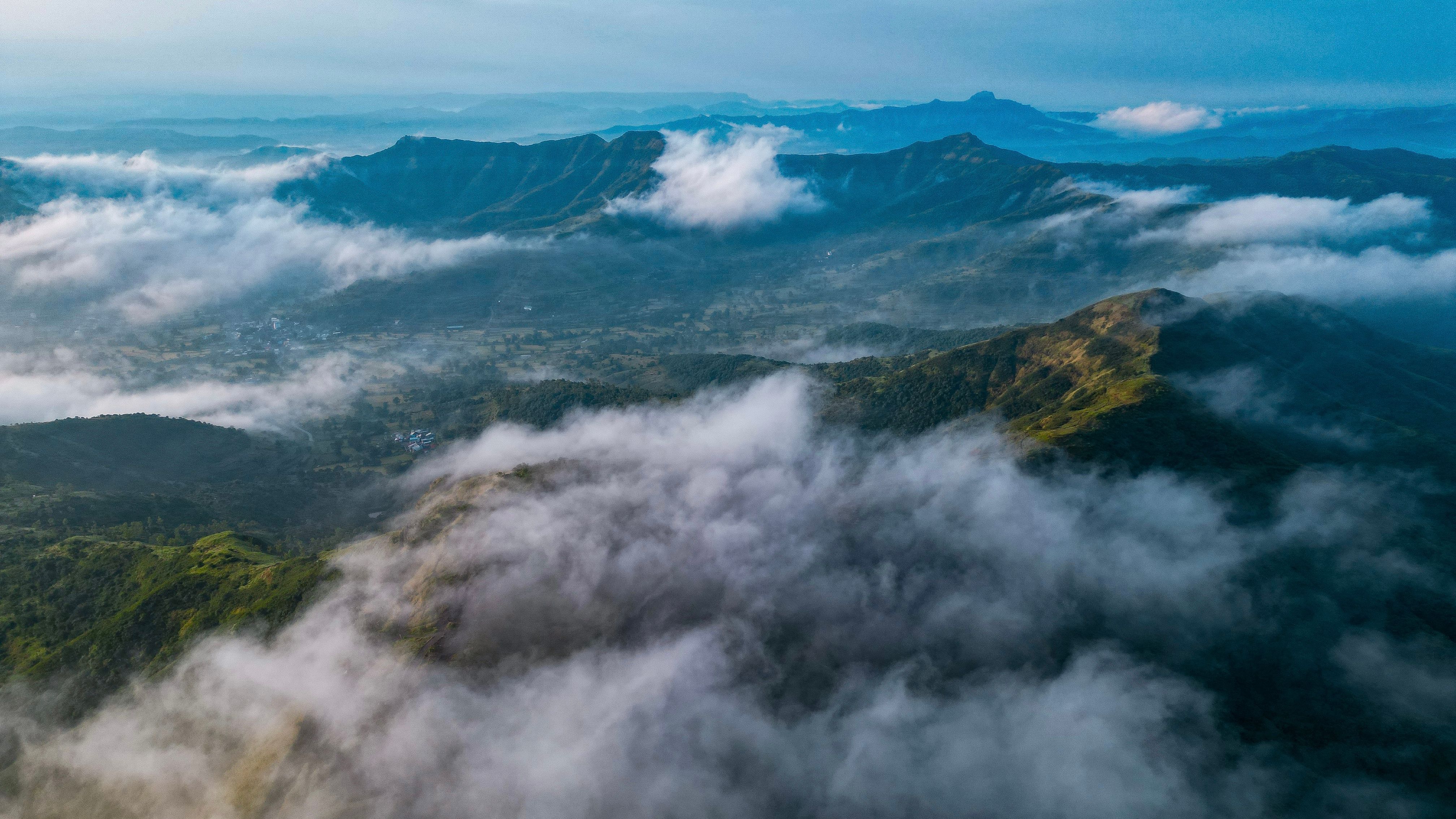 Aerial View of Misty Mountain Landscape · Free Stock Photo