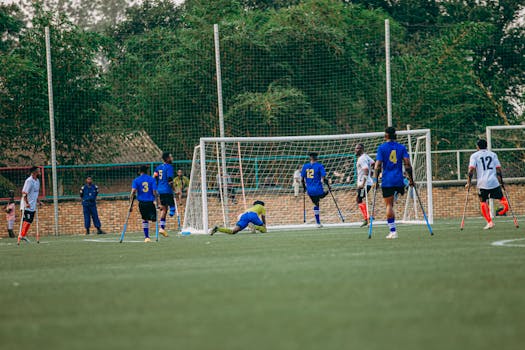 A vibrant amputee football match showcasing skill and teamwork on the field.