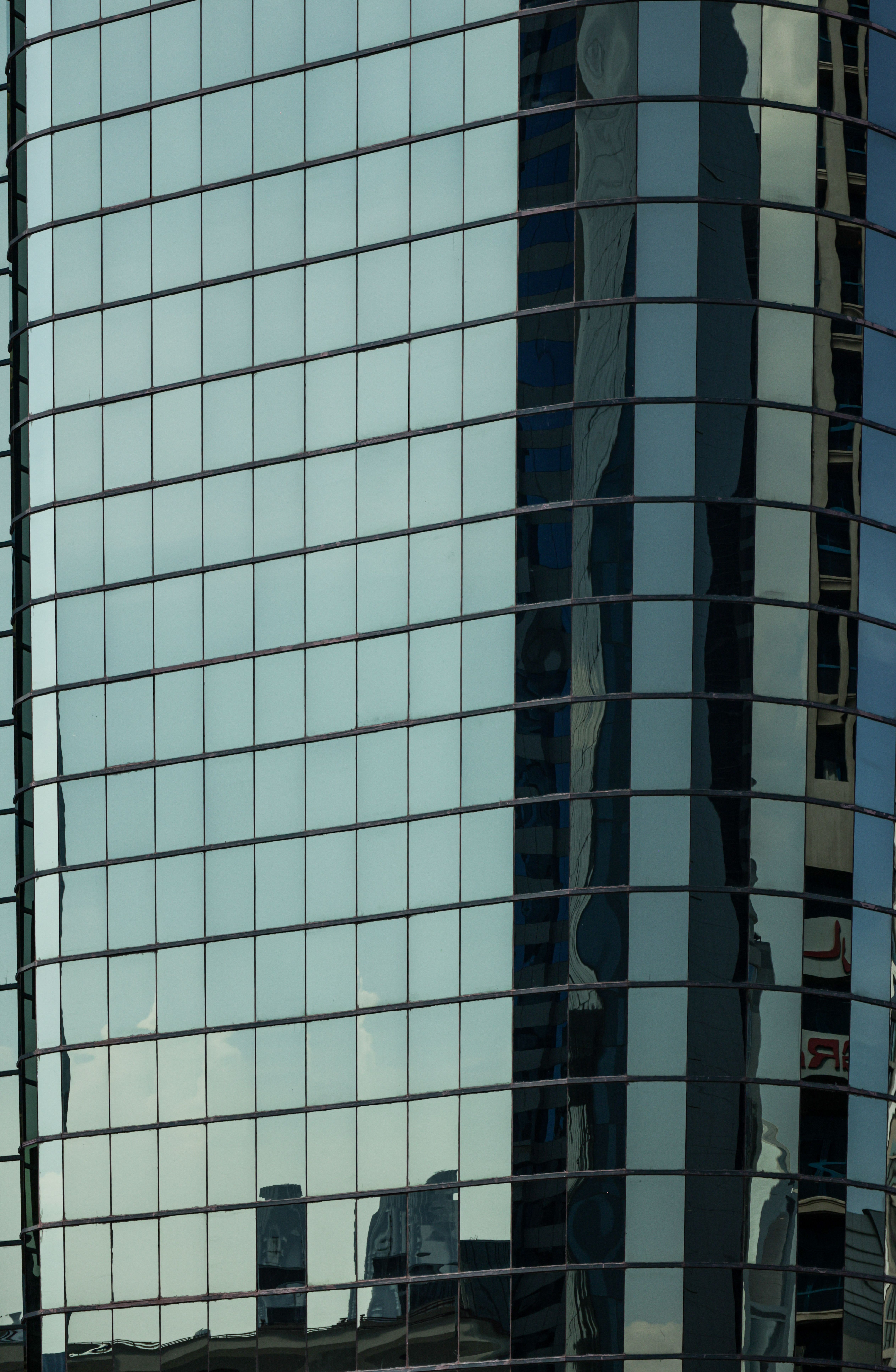 Modern Glass Building with Reflective Windows · Free Stock Photo