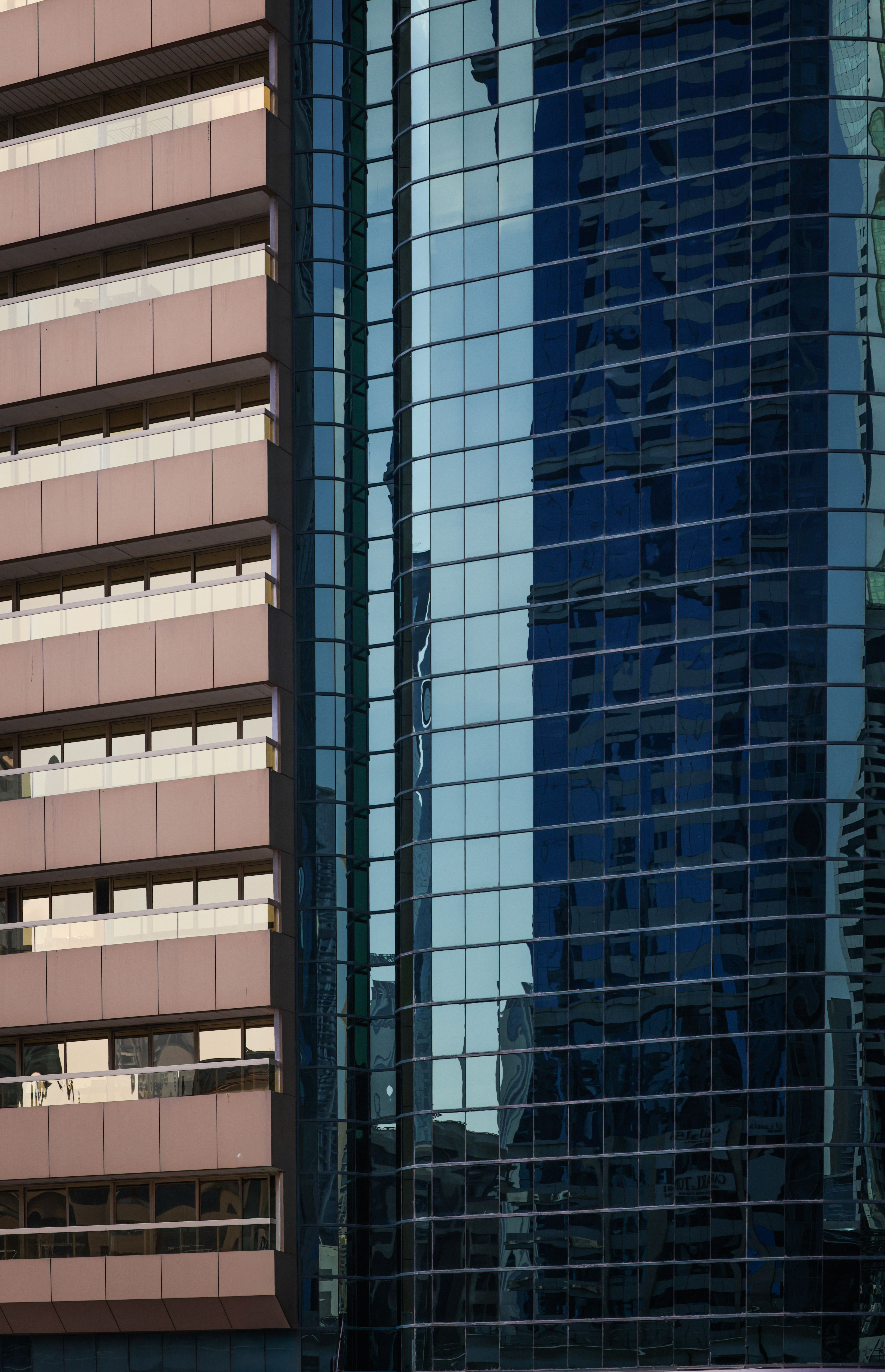 Modern Glass Building with Reflective Windows · Free Stock Photo