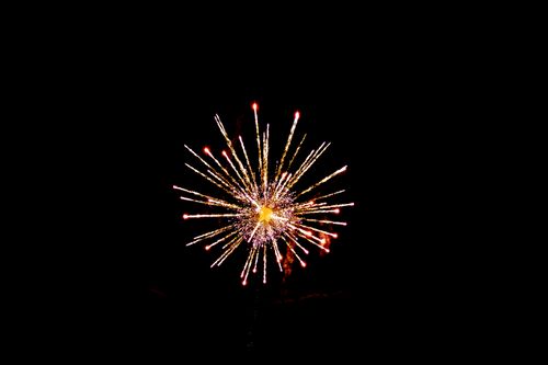 Free Vivid display of fireworks exploding against a dark night sky, capturing the essence of celebration and spectacle. Stock Photo