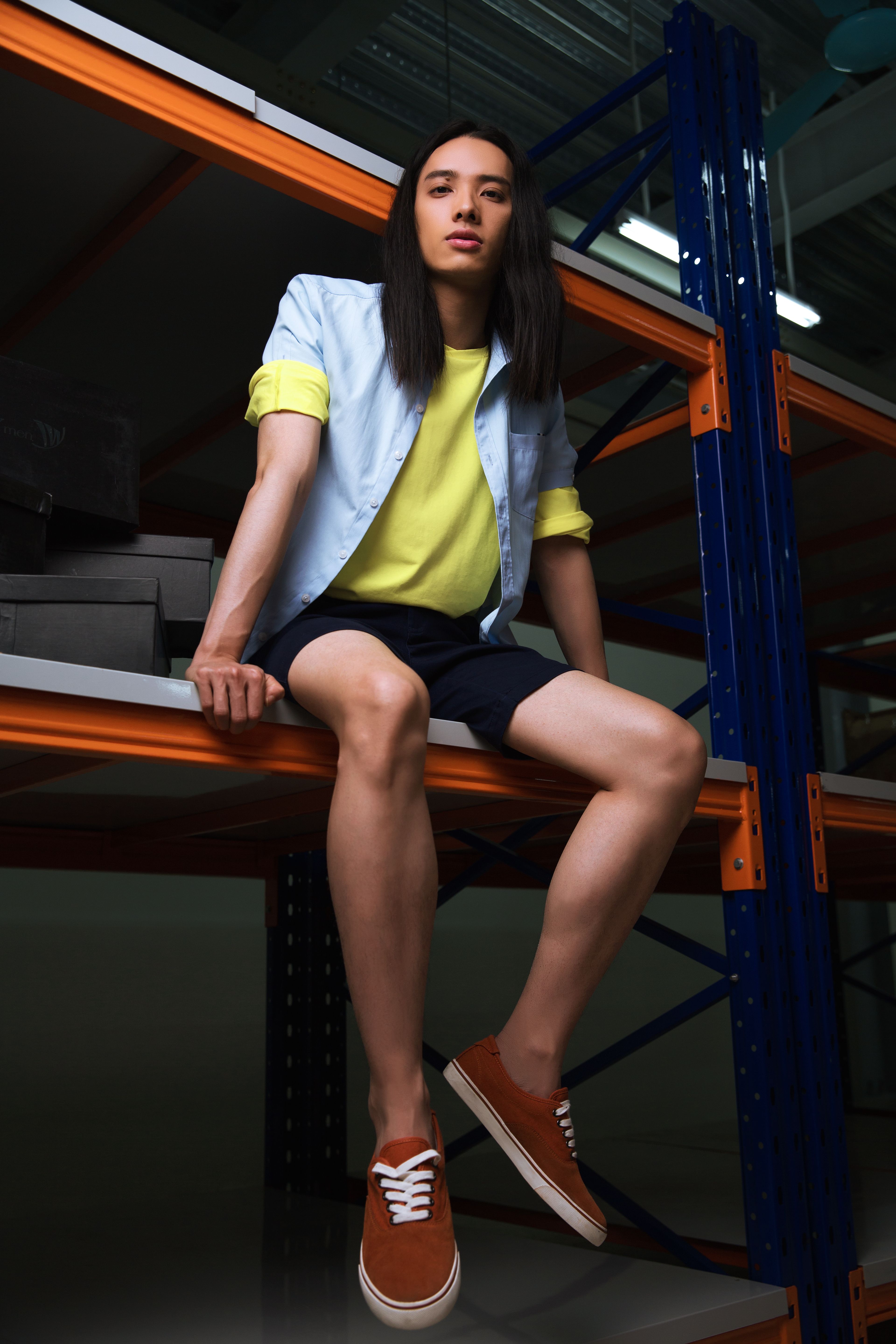 Trendy Young Adult in Industrial Warehouse
