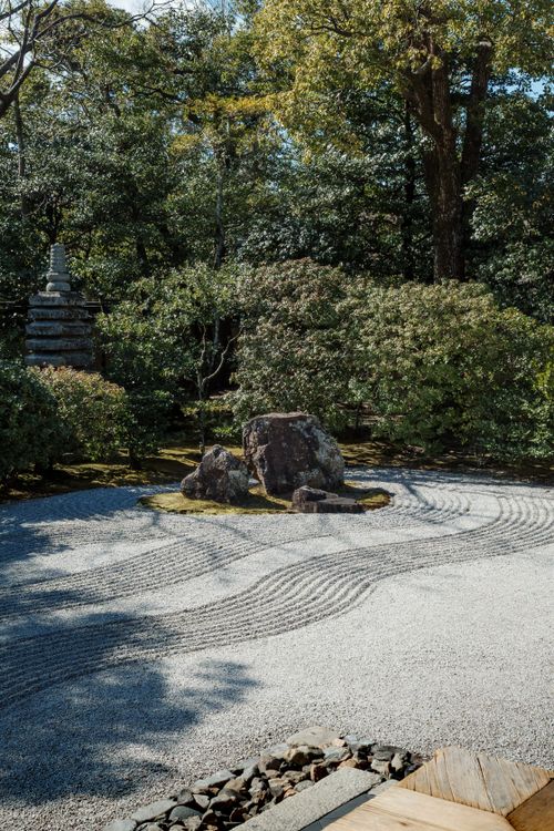 Free Peaceful Japanese Zen garden featuring raked gravel and stone formations. Stock Photo