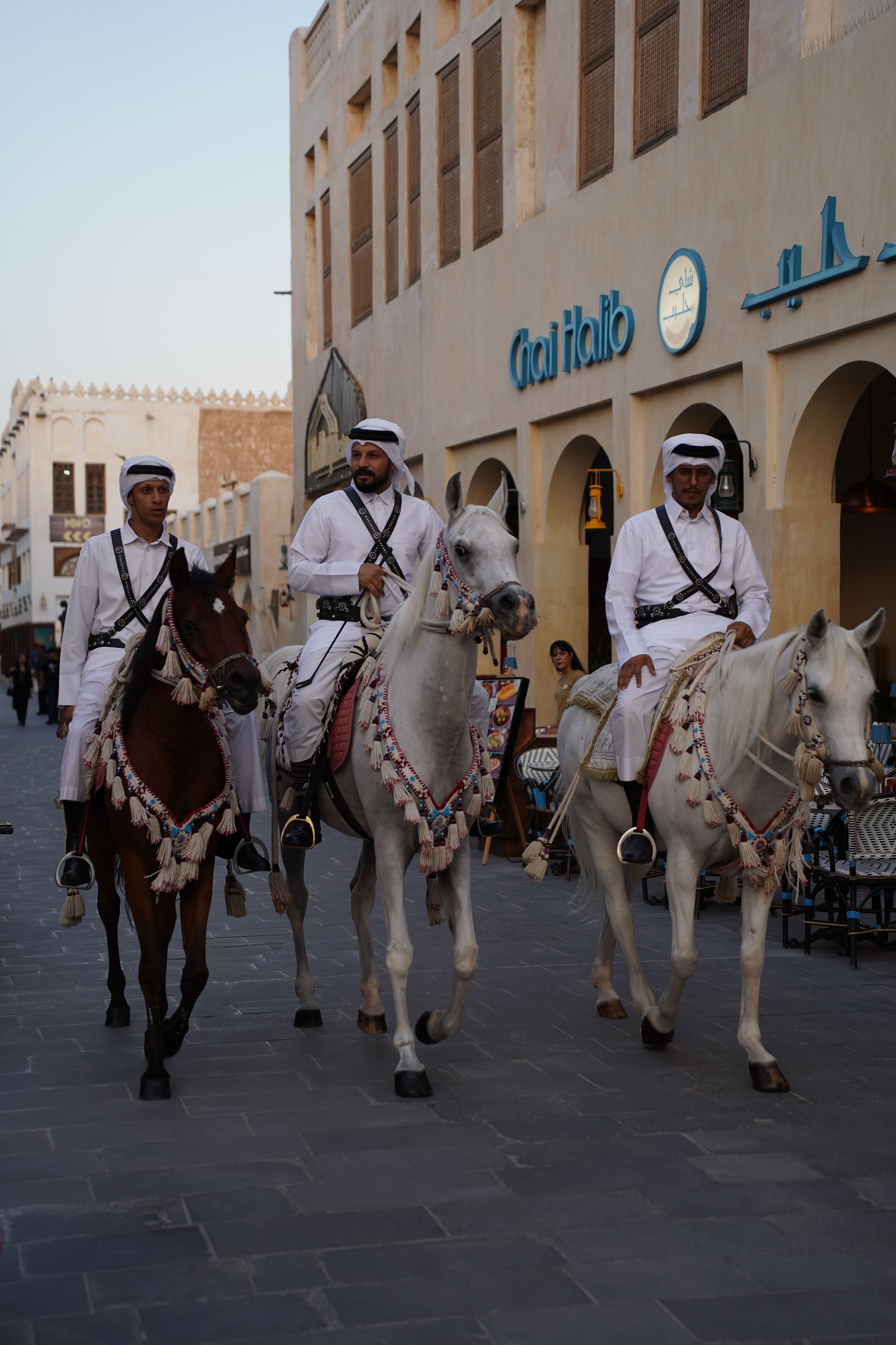Traditional Qatari Horsemen at Souq Waqif · Free Stock Photo