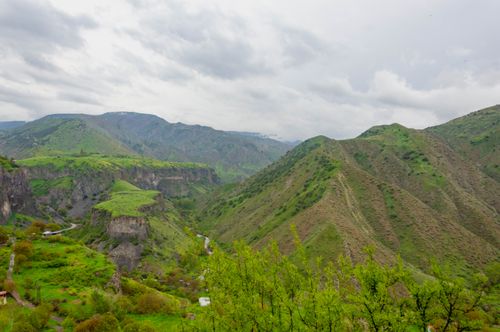 Free Explore the breathtaking lush green mountains and valleys in spring, offering vibrant natural beauty and tranquility. Stock Photo