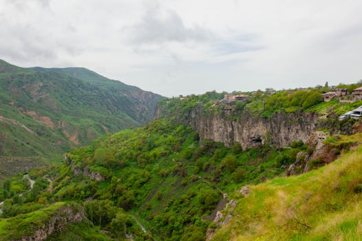 Lush green cliffs and distant hills in Dilijan National Park, Armenia, offering a breathtaking landscape view.