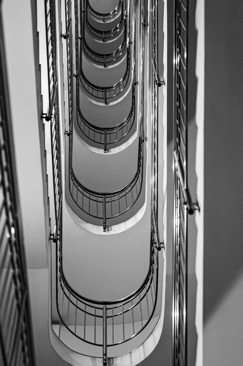 Free Elegant black and white image of a modern staircase with geometric patterns. Stock Photo