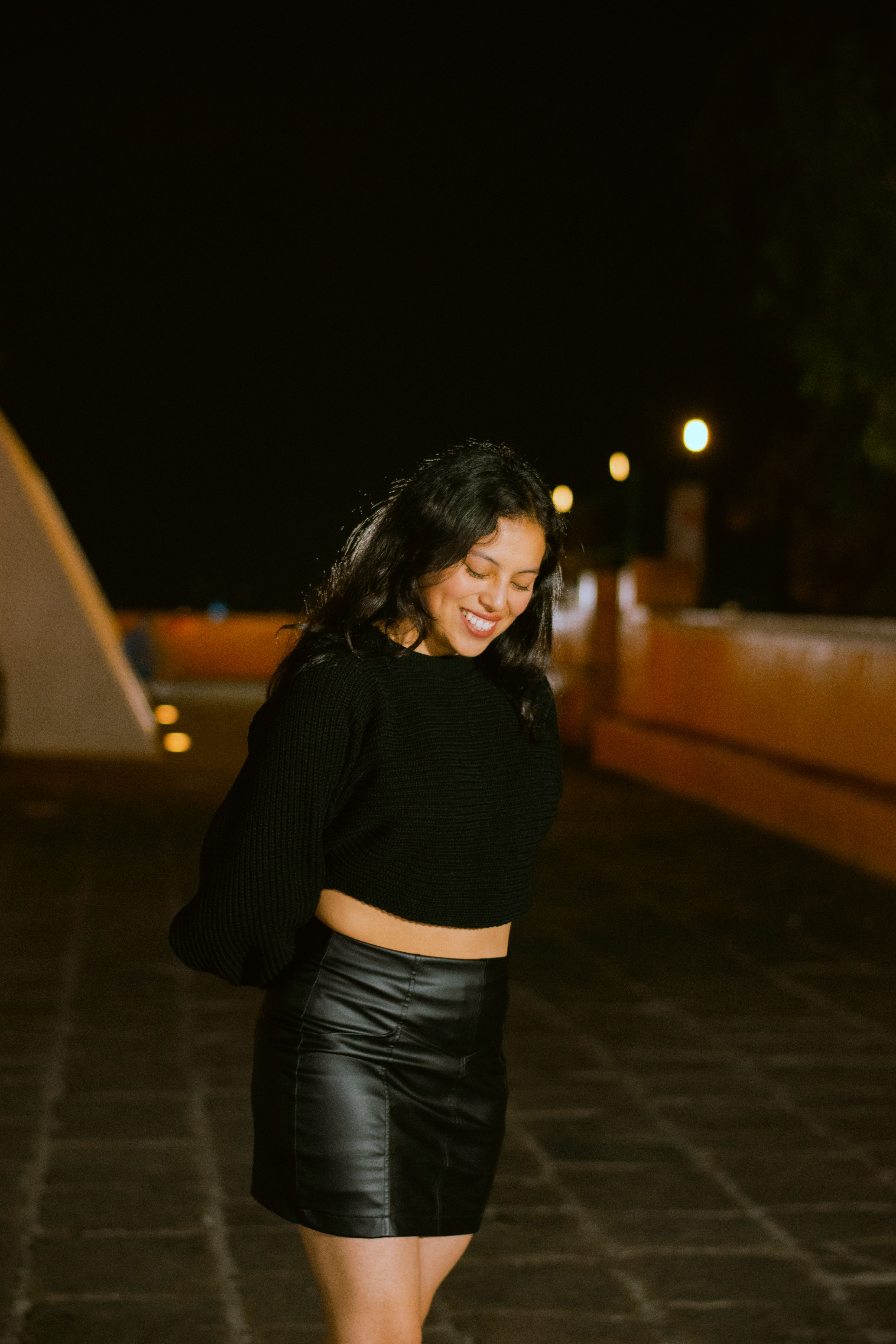 Stylish Woman in Urban Night Setting · Free Stock Photo