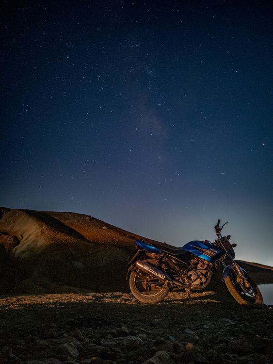 Motorcycle under Starry Night Sky · Free Stock Photo