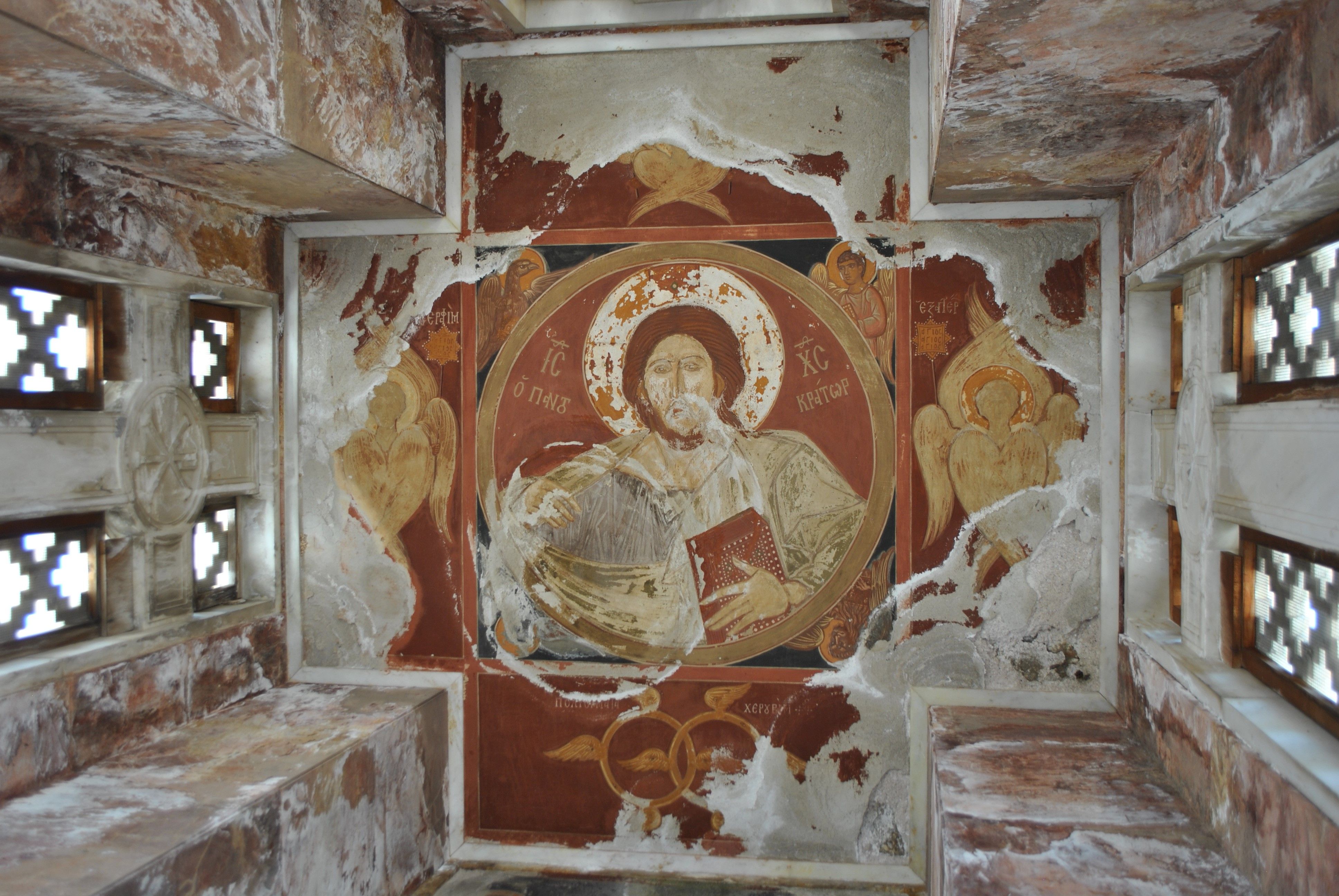 Steep-pitched wooden roof of a small Byzantine church in a Troodos village