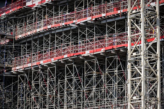 A detailed view of steel scaffolding on a construction site, showcasing architectural design.