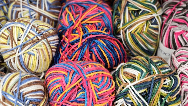 Vibrant and colorful balls of yarn perfect for knitting and craft projects.