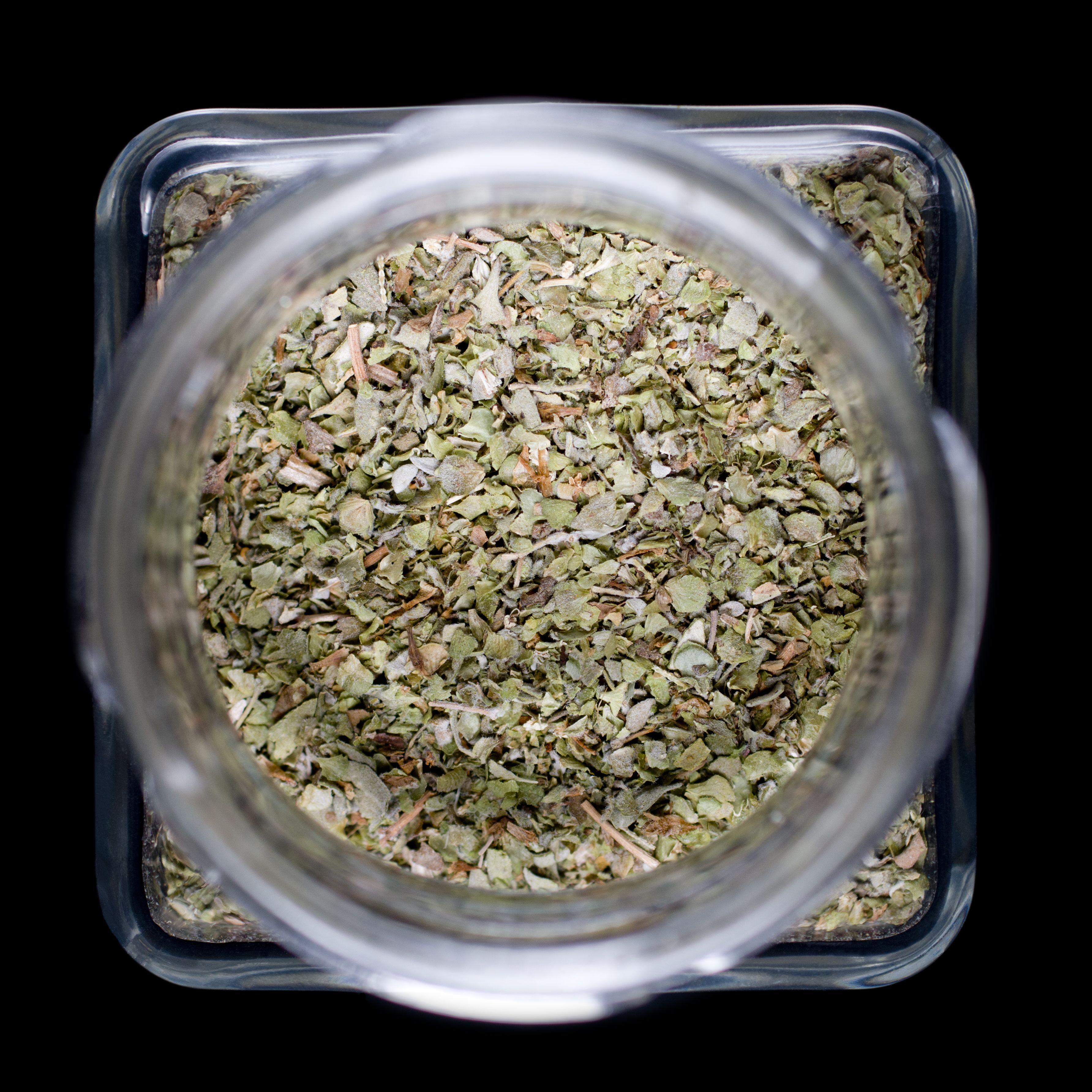 Jar of dried marjoram leaves — photo by Marek Ruczaj on Pexels