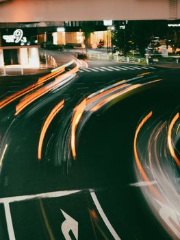 Vibrant long exposure of city traffic lights creating dynamic trails at night.