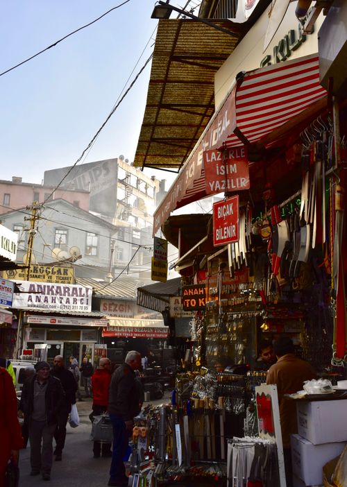 Free Vibrant street market scene captured during the day in Ankara, Turkey, showcasing local shops and pedestrians. Stock Photo