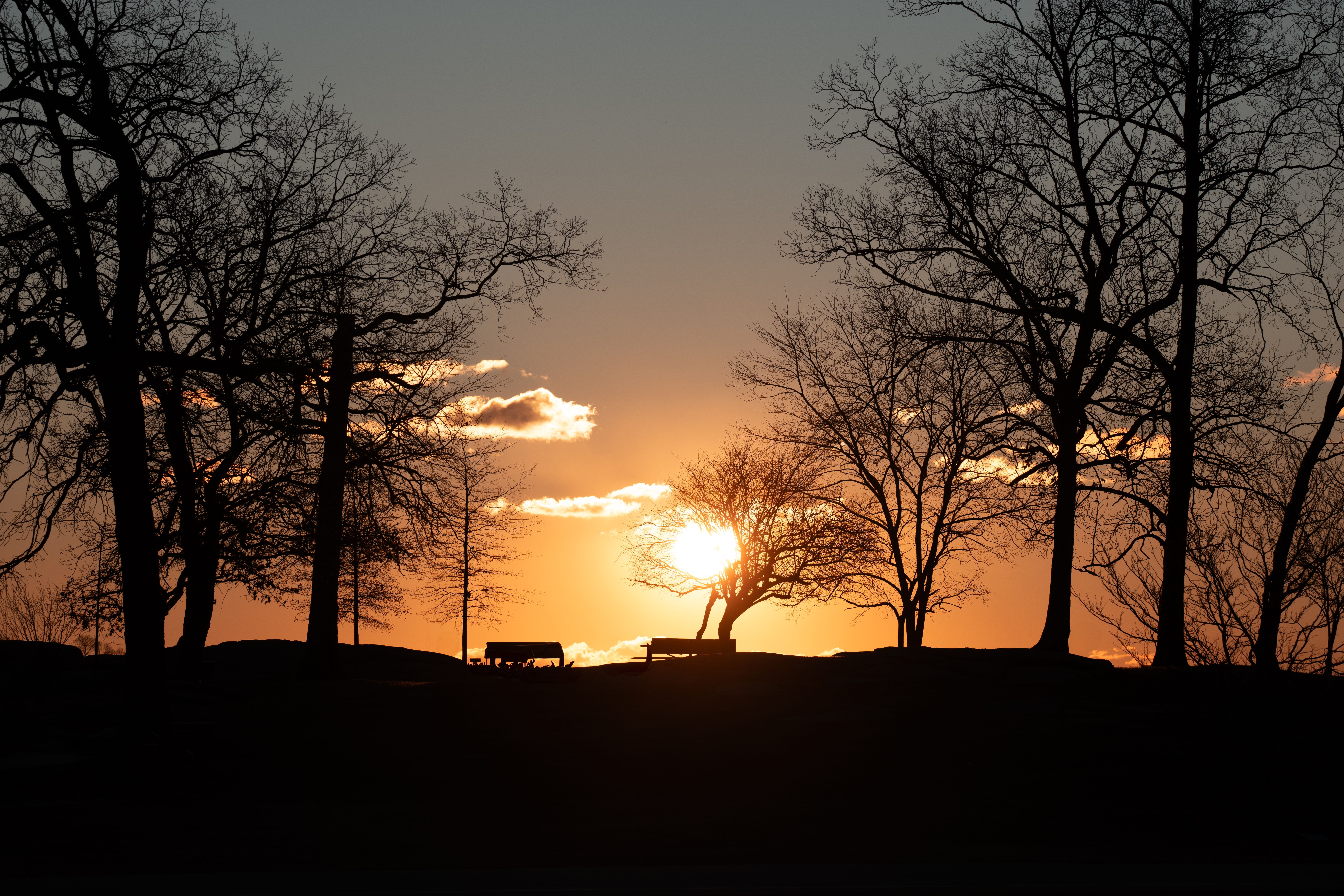 Stonehenge stones silhouetted at dawn