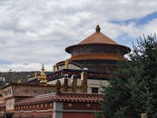 Tibetan Buddhist Monastery Against Cloudy Sky