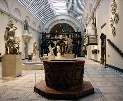 Interior view of the Victoria and Albert Museum showcasing classical sculptures.