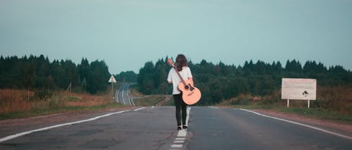 Free stock photo of acoustic guitar, asphalt road, girl