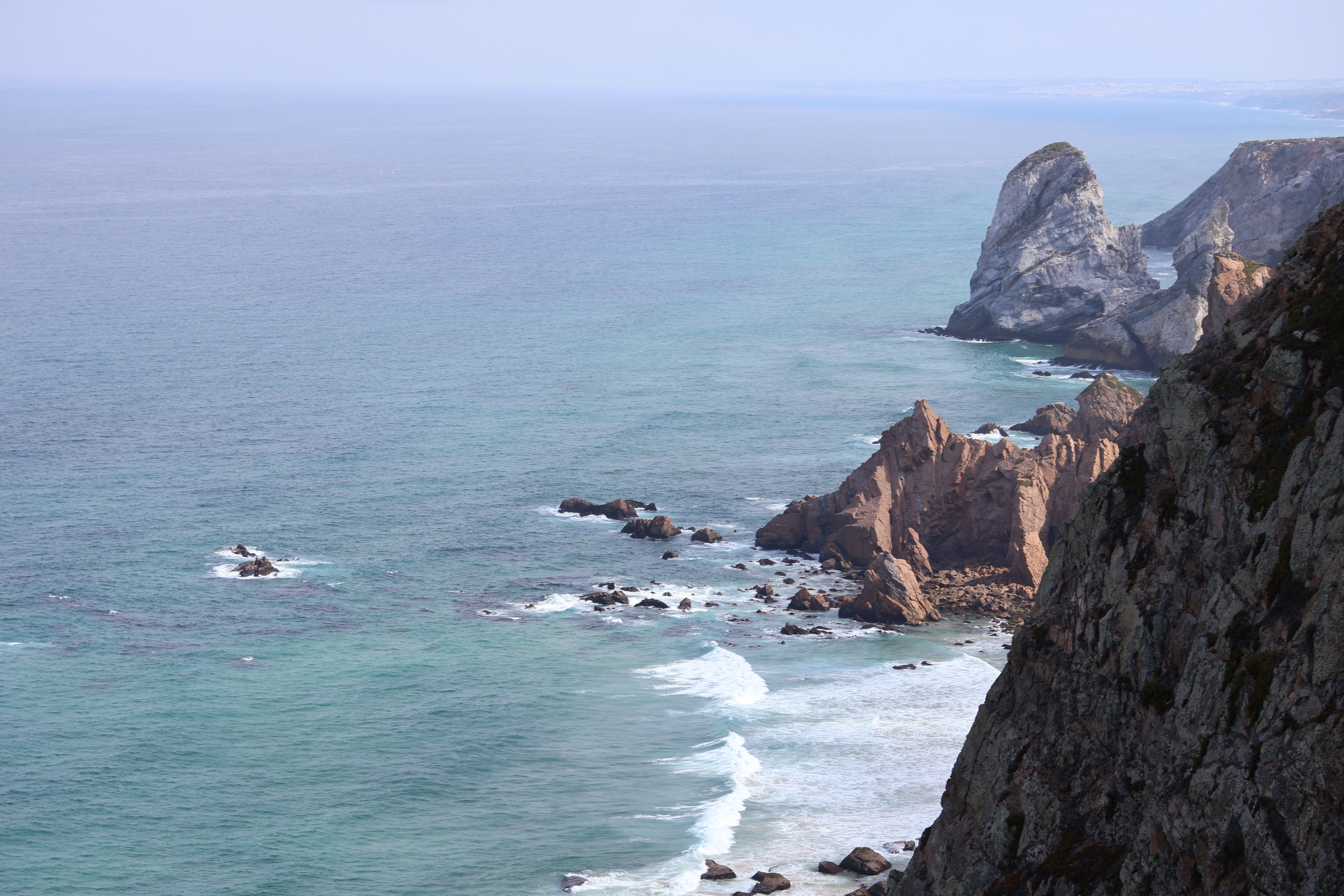 Dramatic Cliffs of Colares, Portugal's Rugged Shoreline · Free Stock Photo