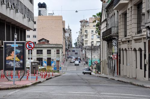 Free A bustling street scene in Montevideo, showcasing historic architecture and daily city life. Stock Photo