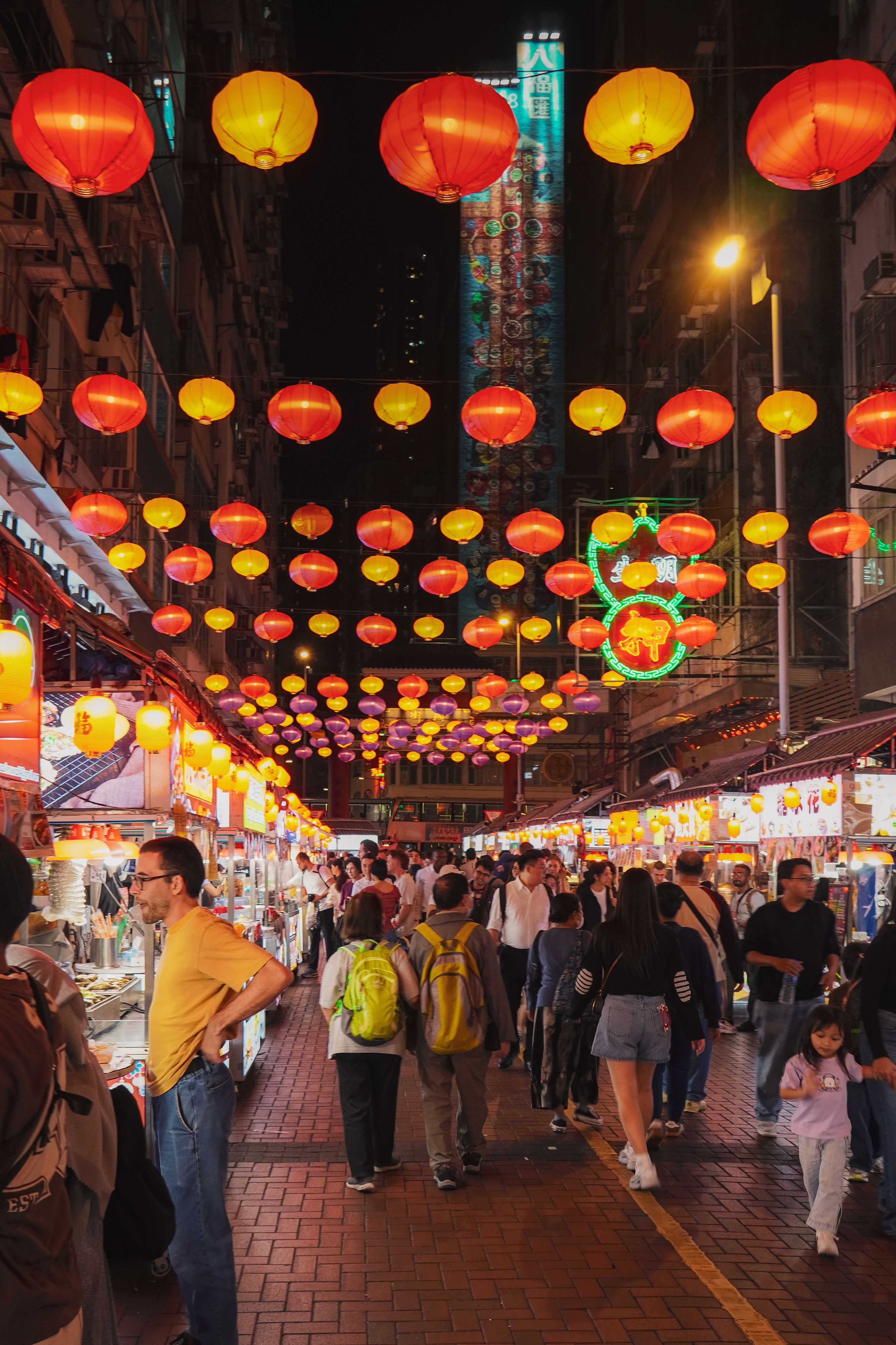 Red lanterns illuminating Chinatown Street Market stalls in Singapore at night