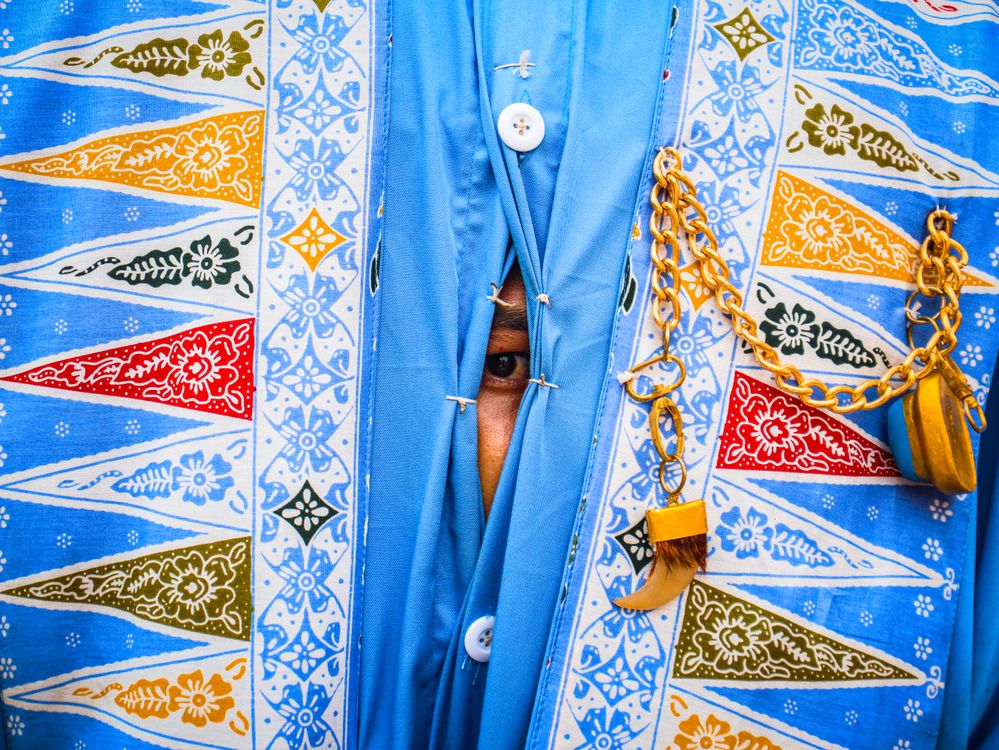 Batik Eye Color Colorful Batik Fabric with Eye Peeking Through · Free Stock Photo