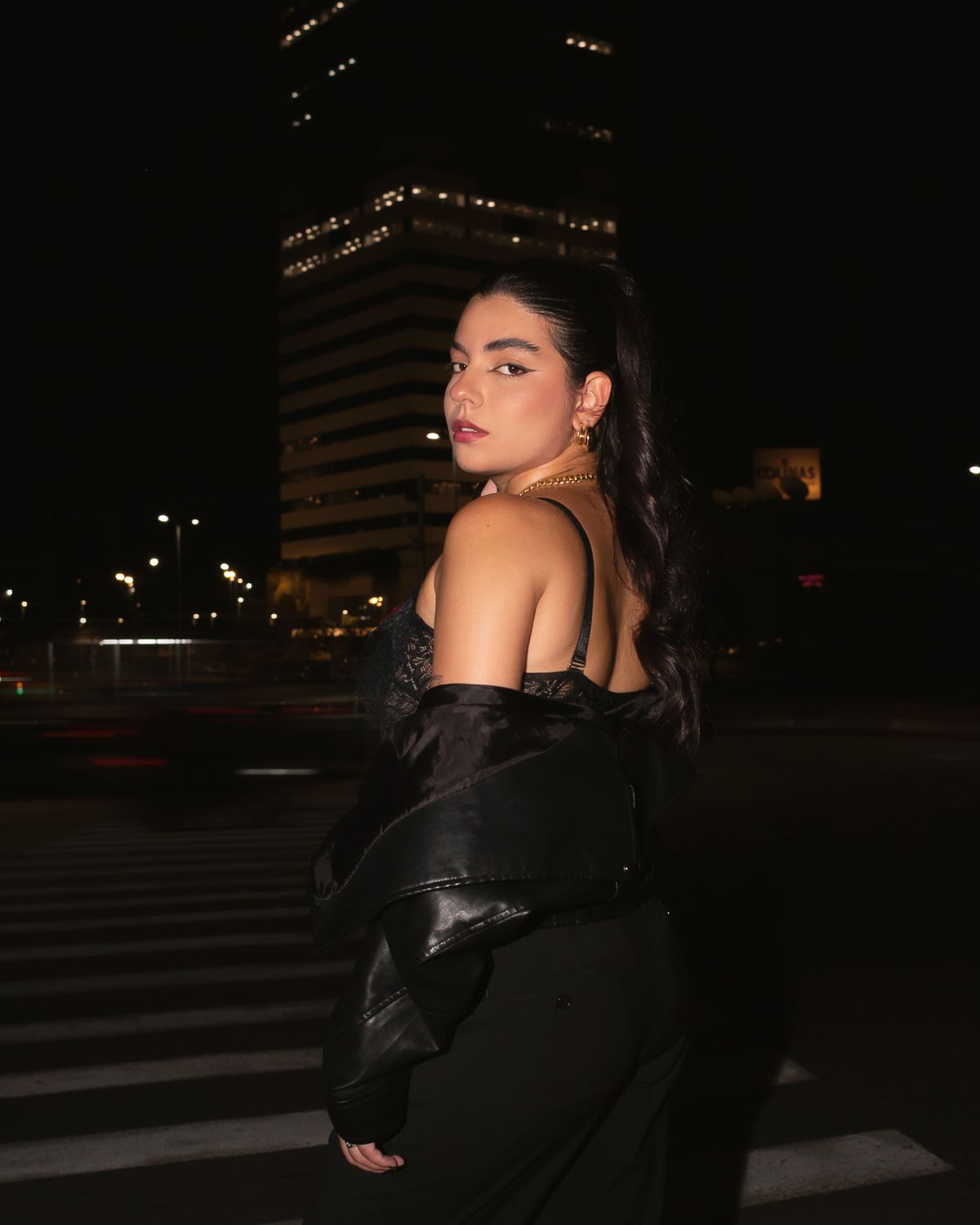 Elegant Woman Posing on Night City Street · Free Stock Photo