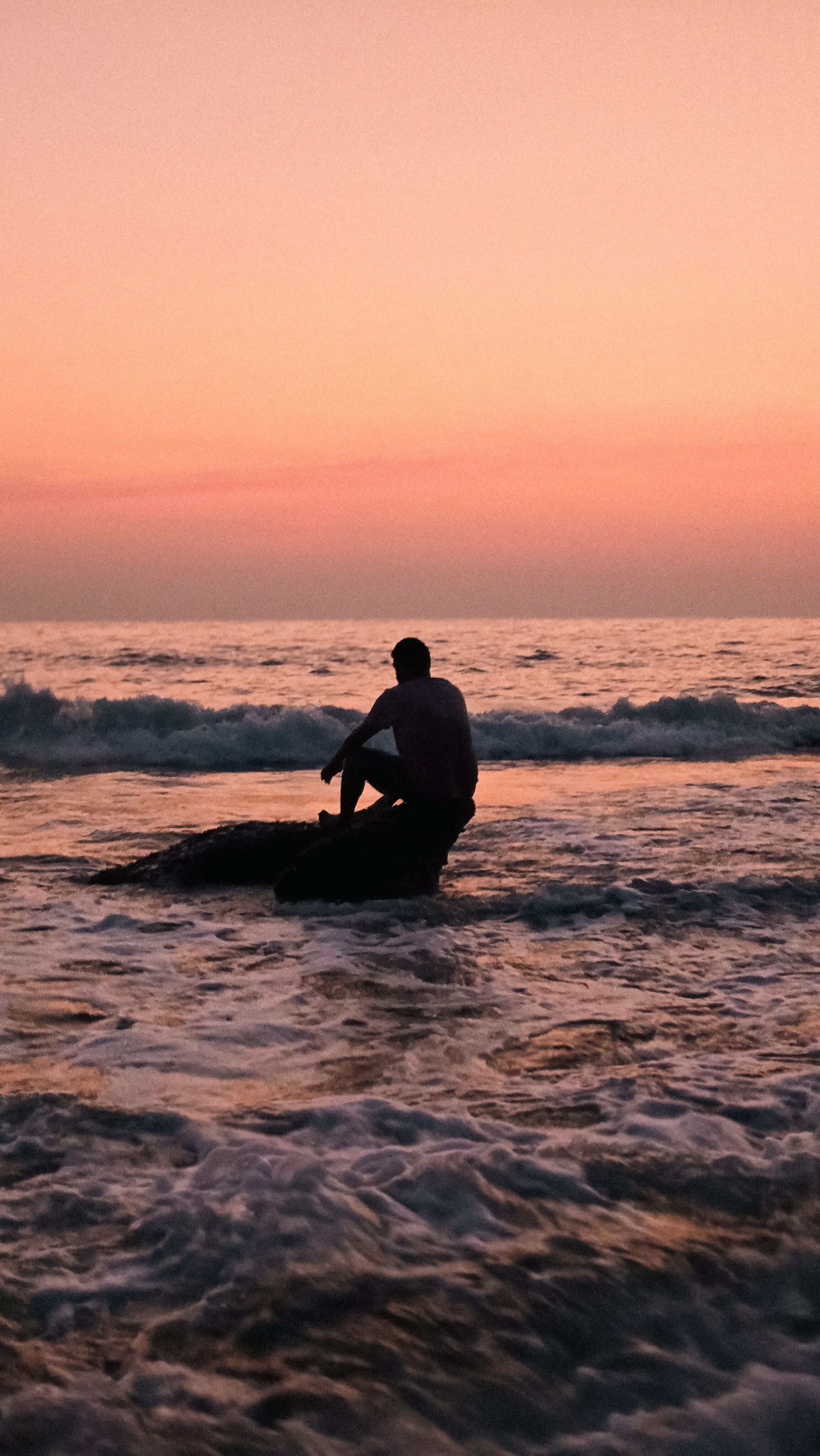 Silhouette of Man by Ocean at Sunset · Free Stock Photo